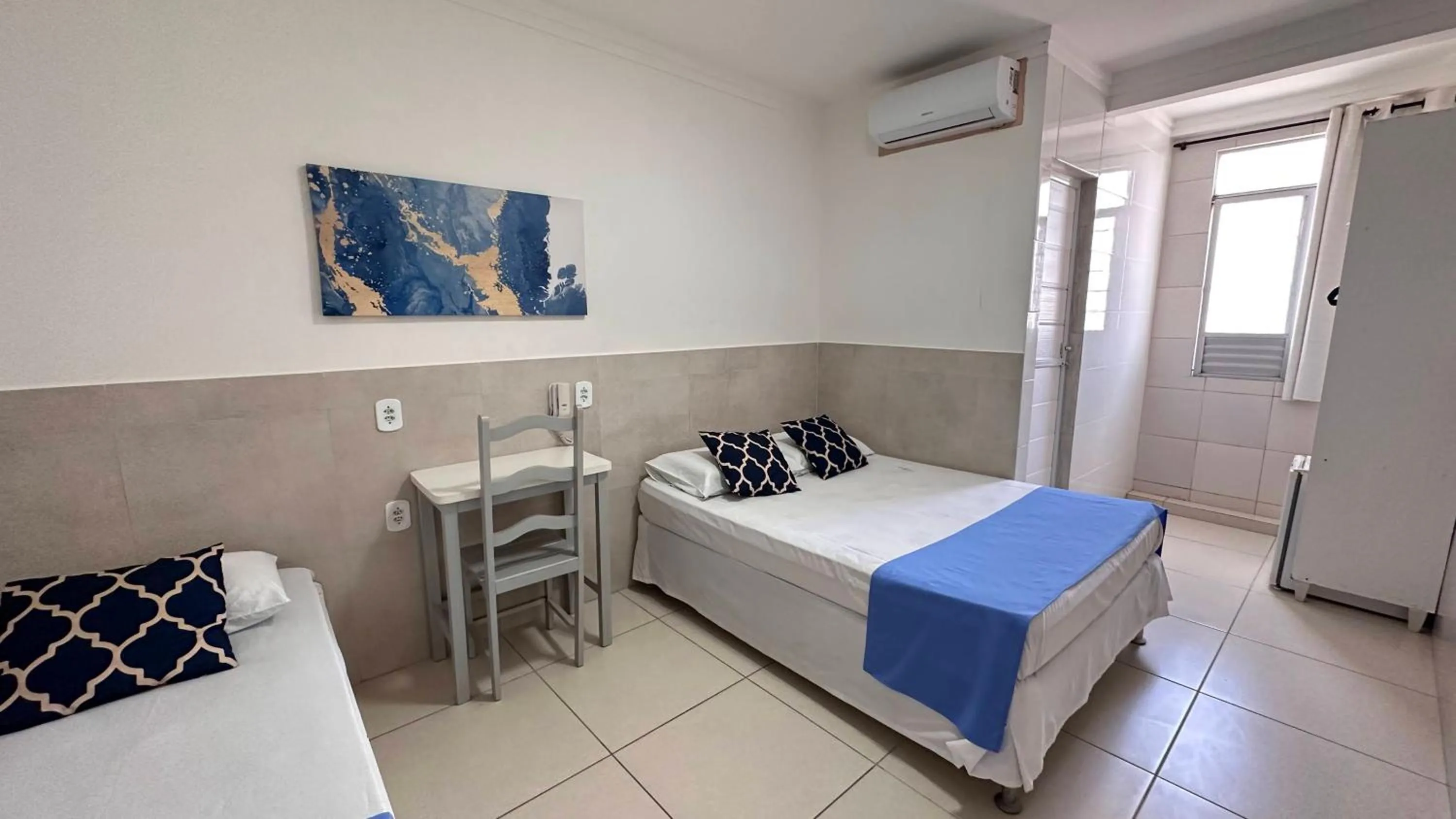 Bed in Pousada São Luiz