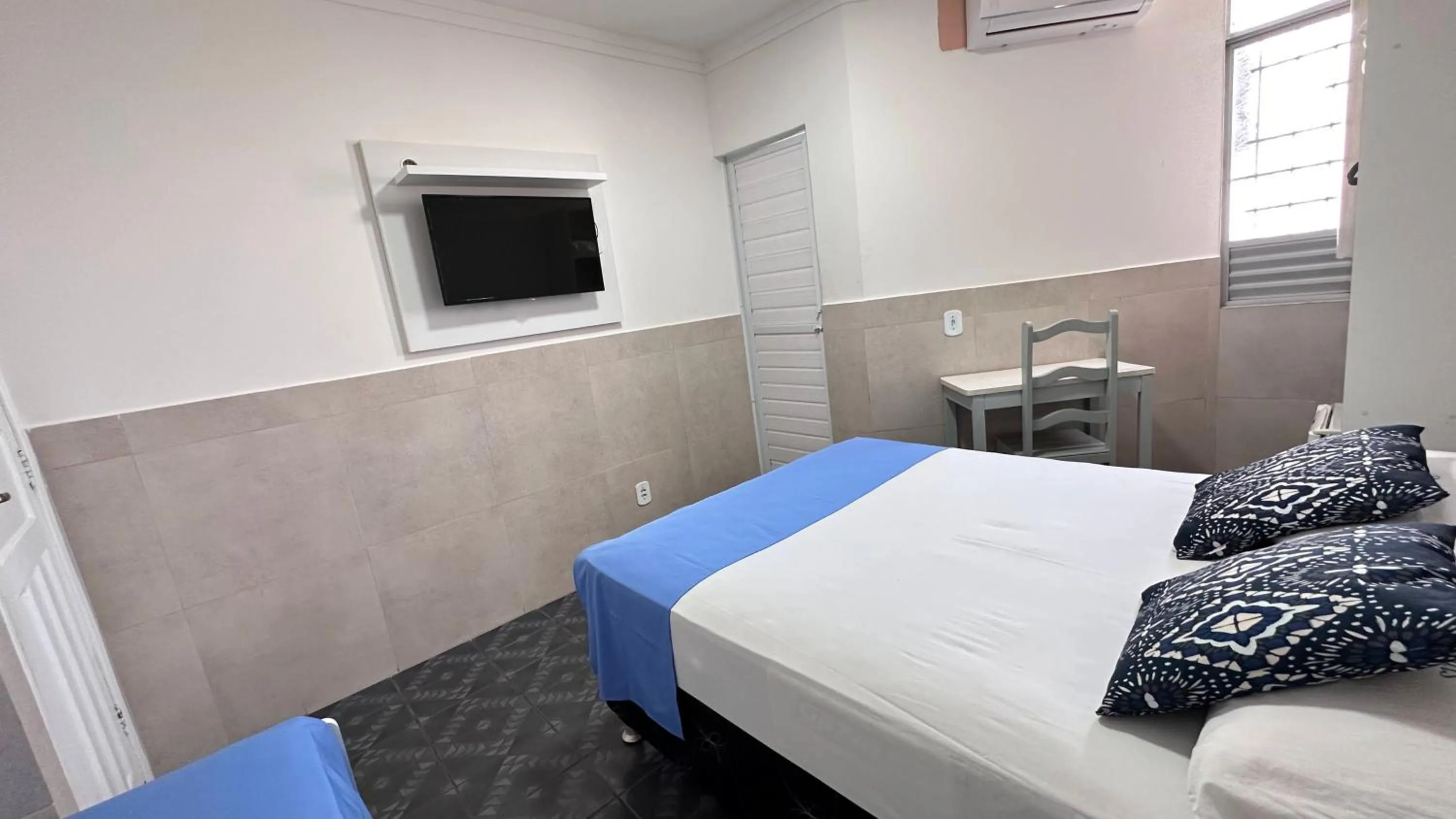 Bed in Pousada São Luiz