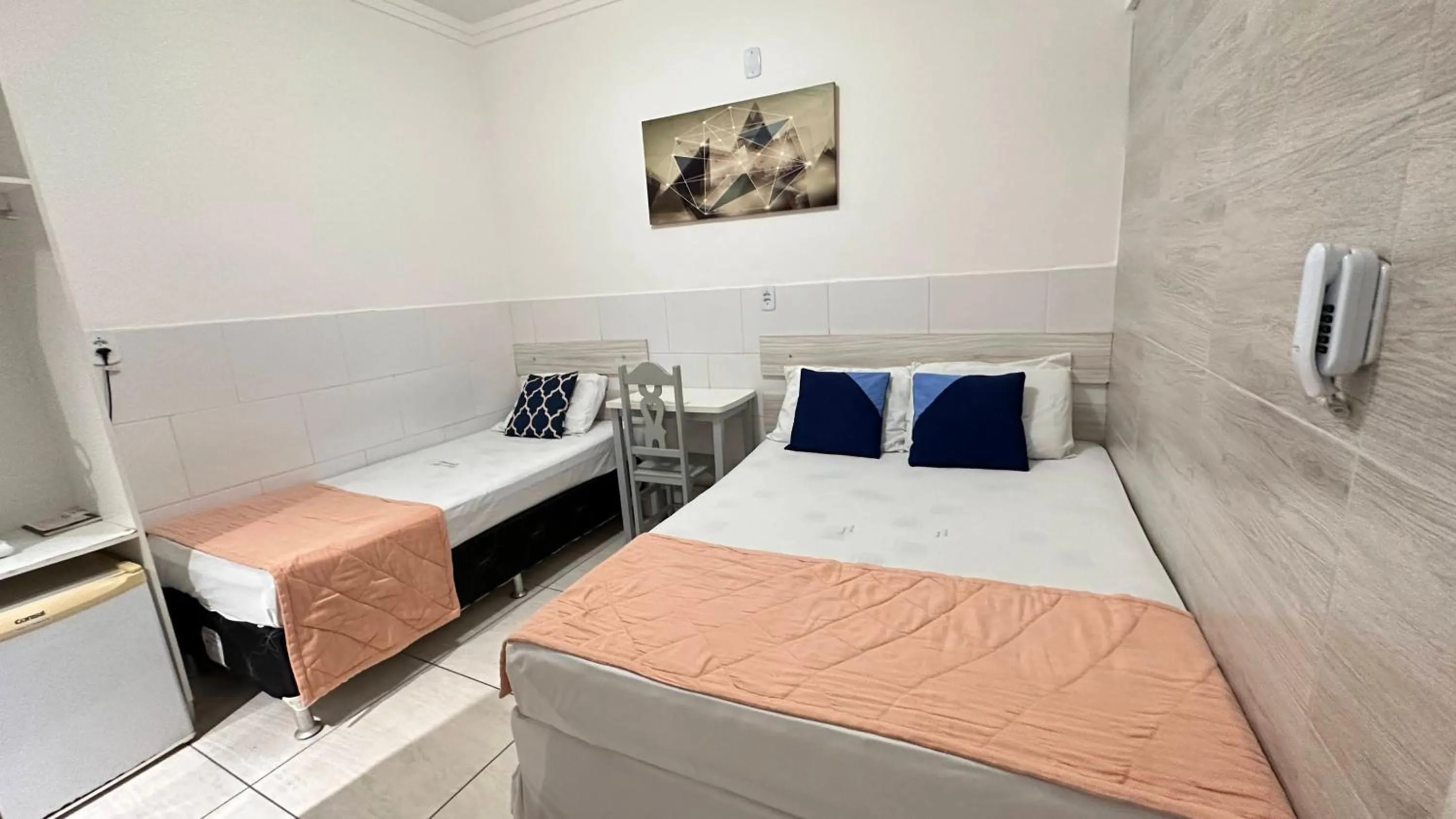 Bed in Pousada São Luiz