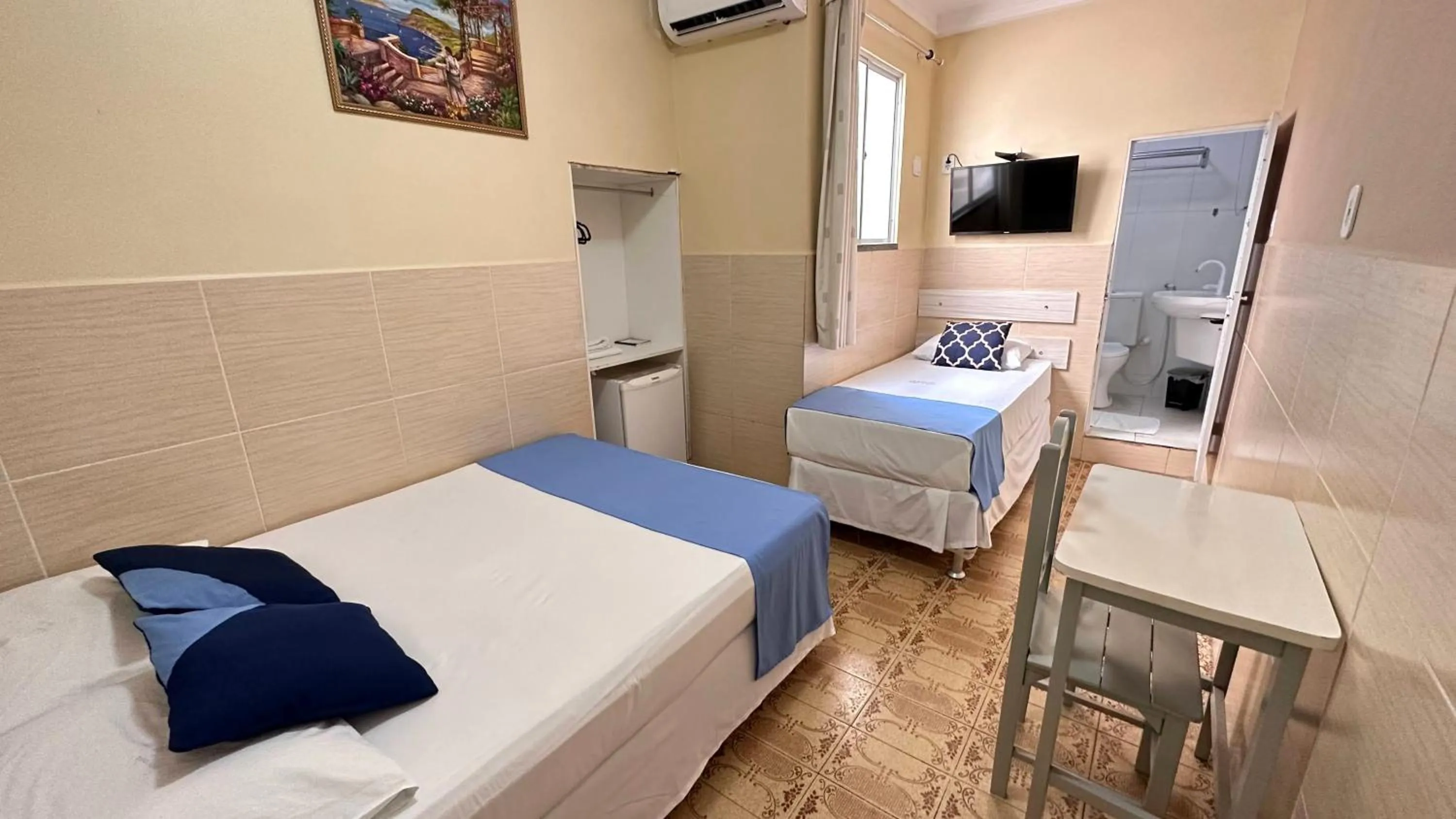 Bed in Pousada São Luiz