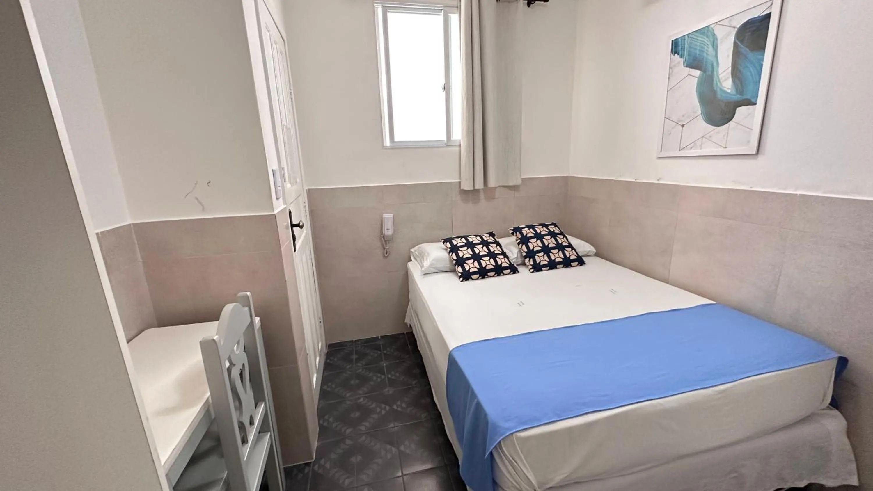 Bed in Pousada São Luiz