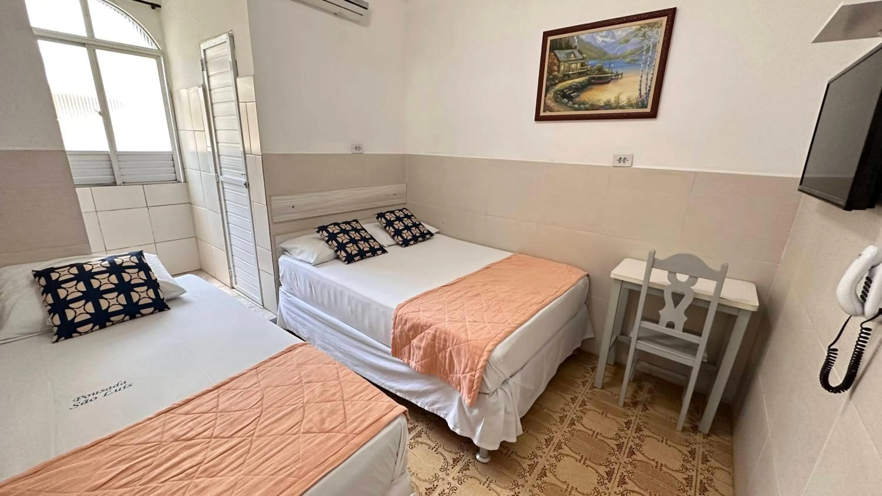 Bed in Pousada São Luiz