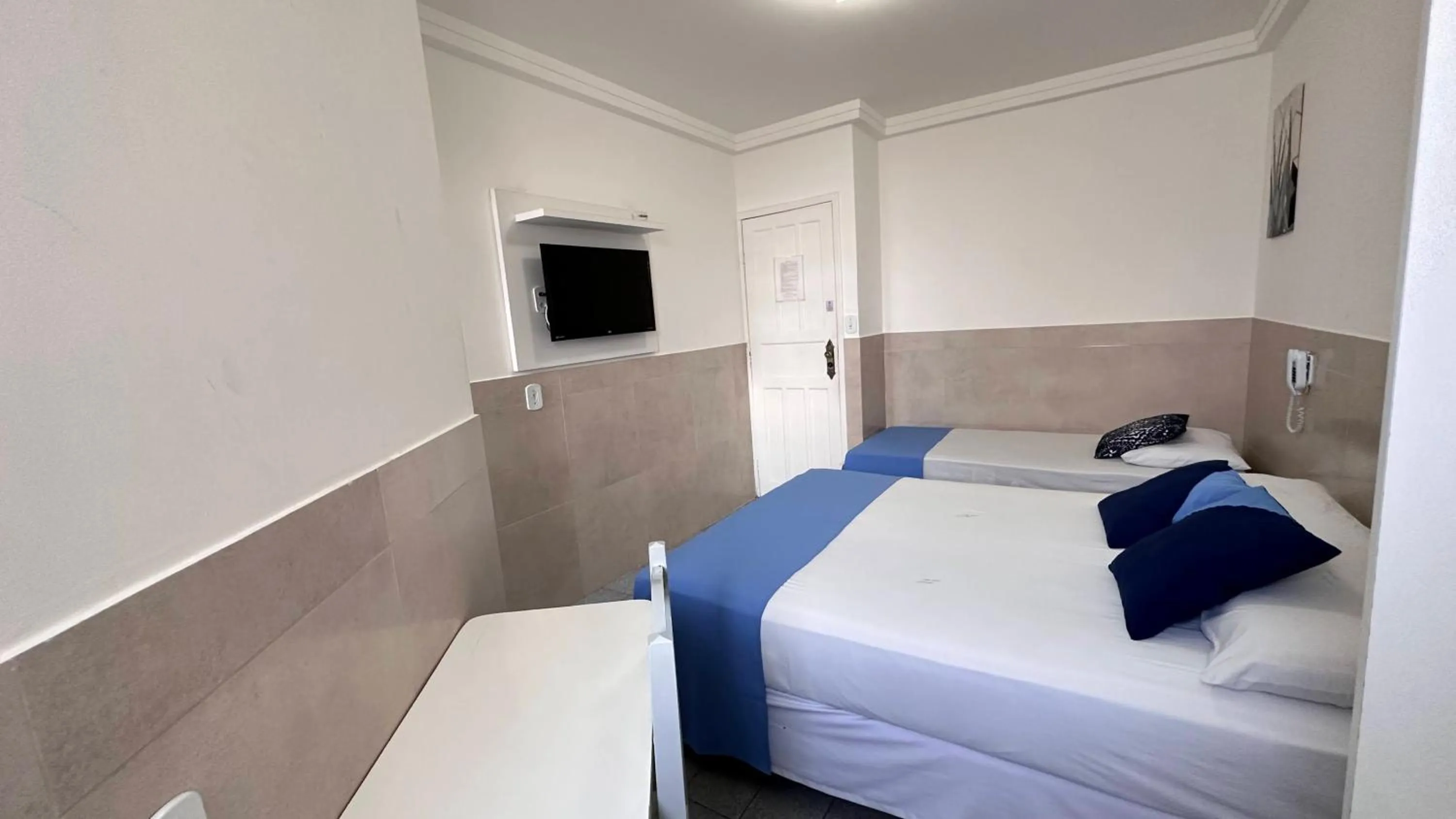 Bed in Pousada São Luiz