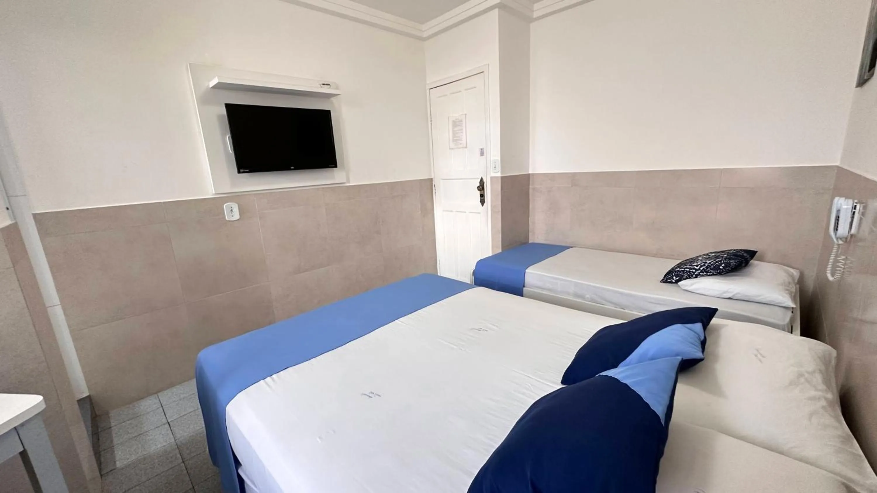 Bed in Pousada São Luiz