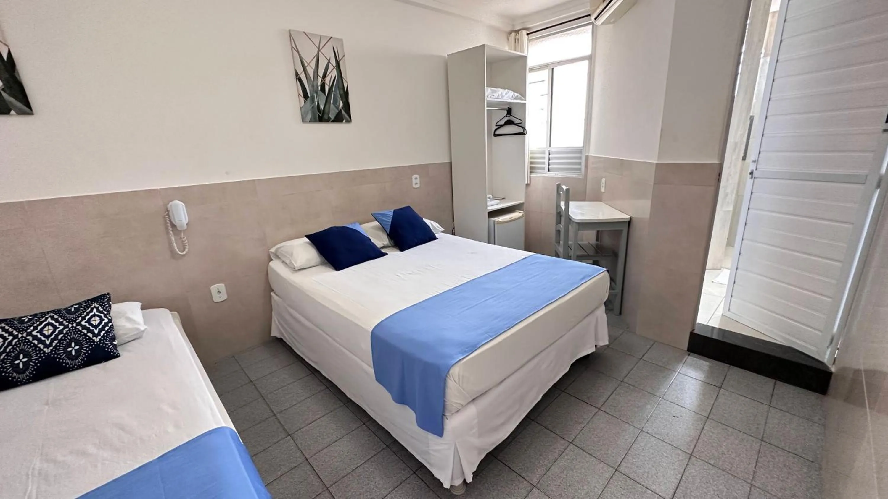 Bed in Pousada São Luiz