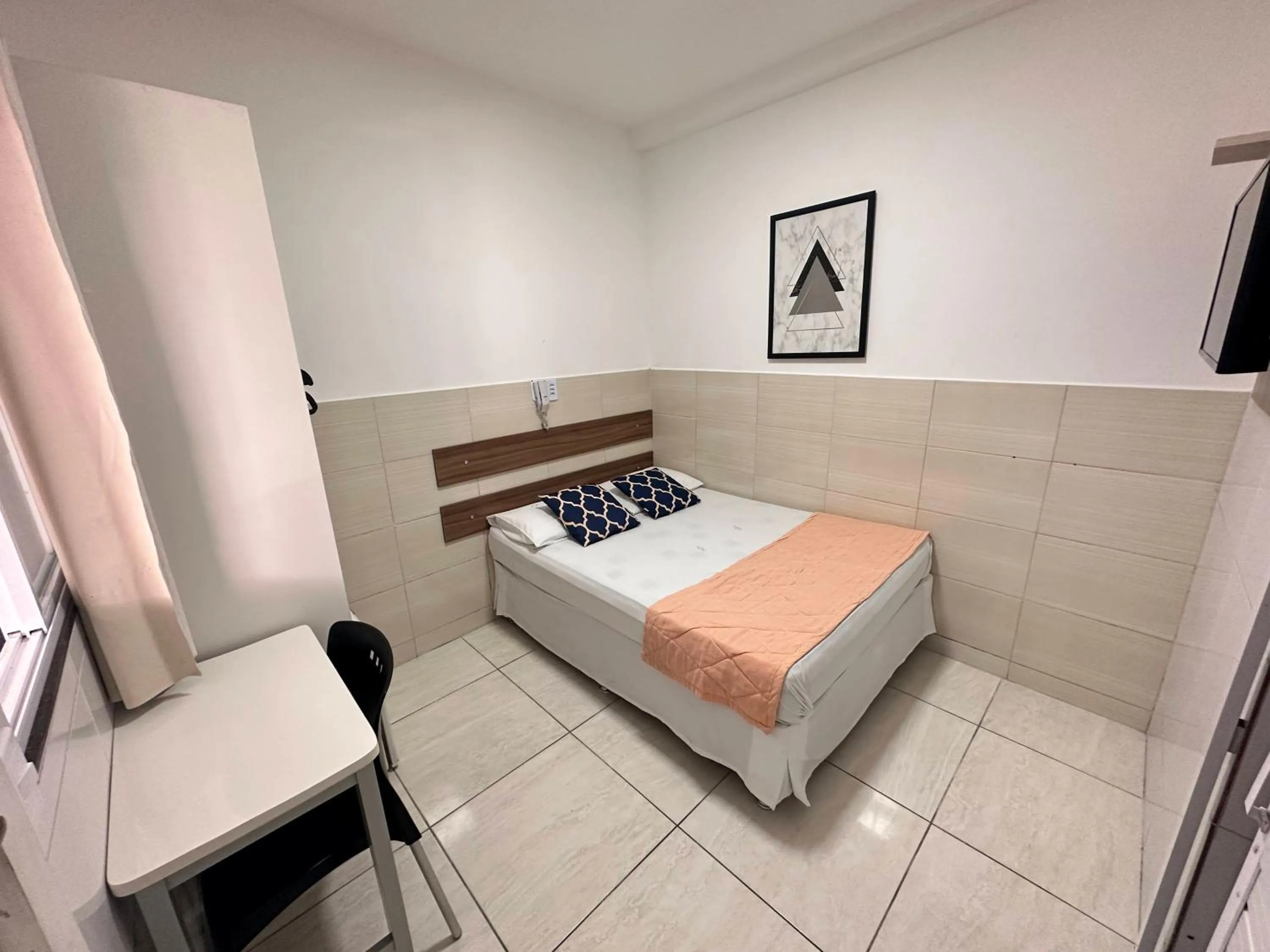 Bed in Pousada São Luiz