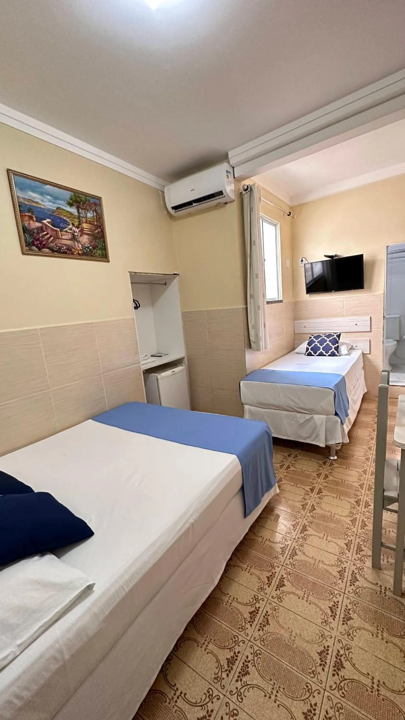 Bed in Pousada São Luiz