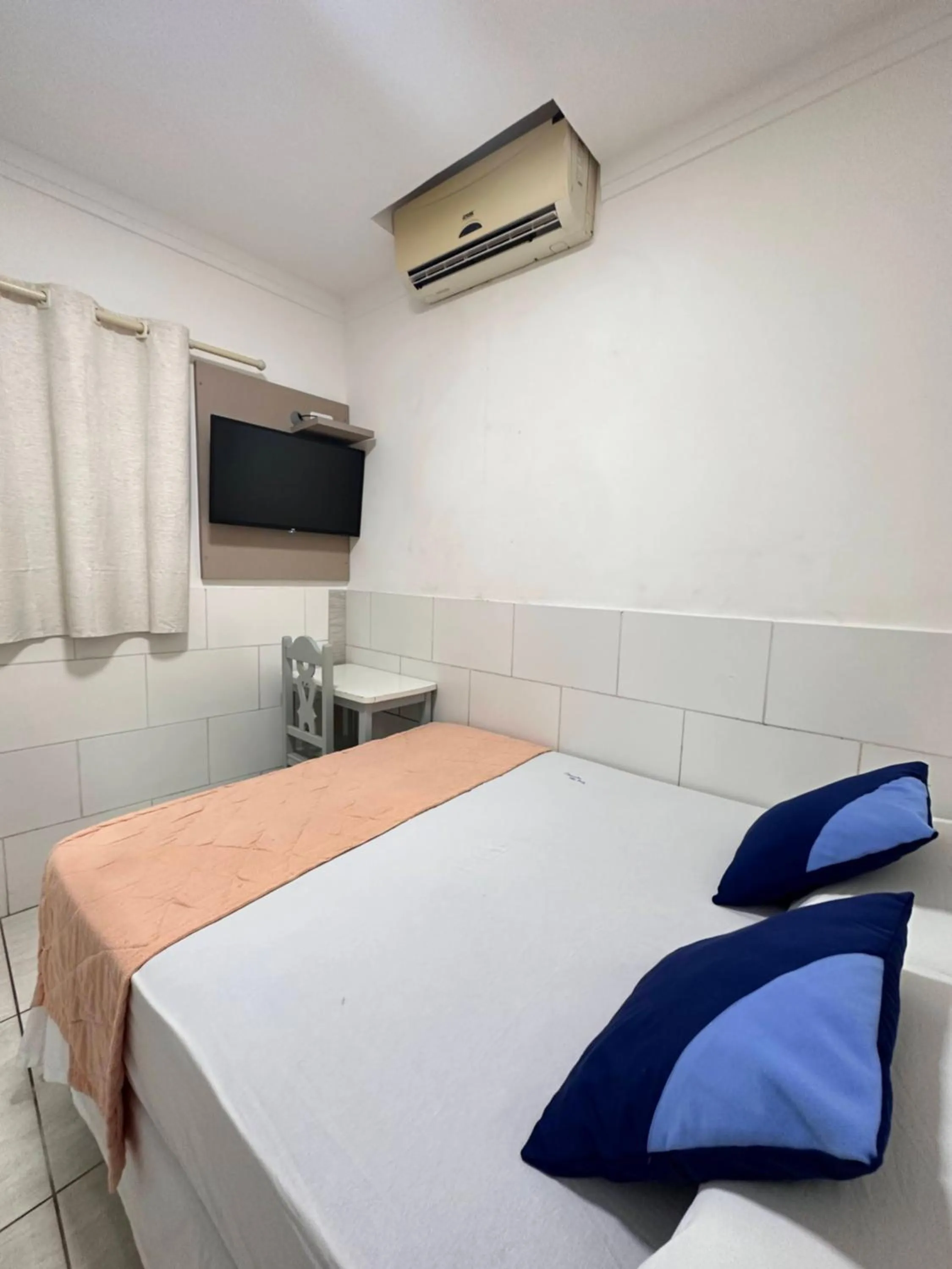 Bed in Pousada São Luiz