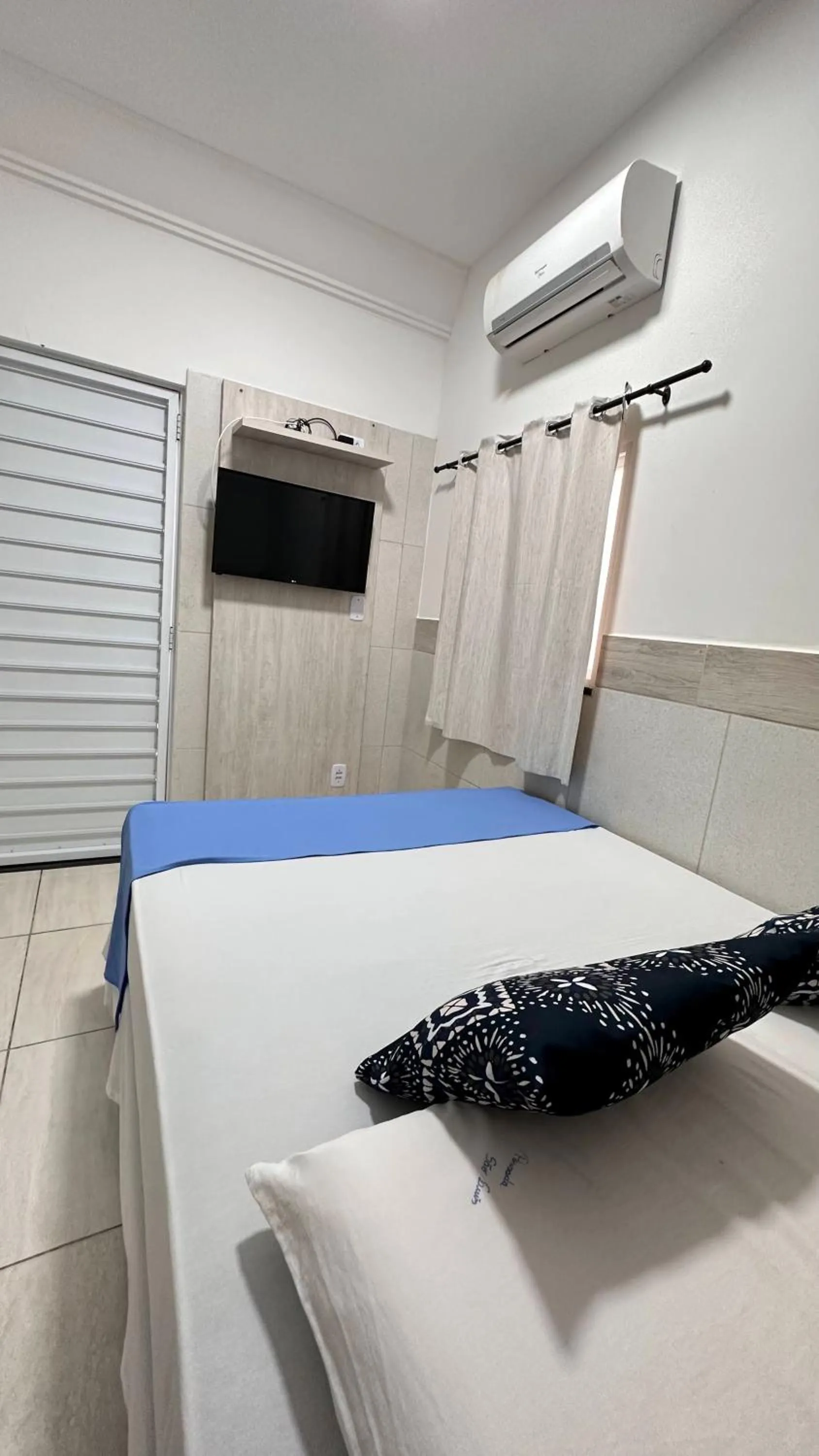 Bed in Pousada São Luiz