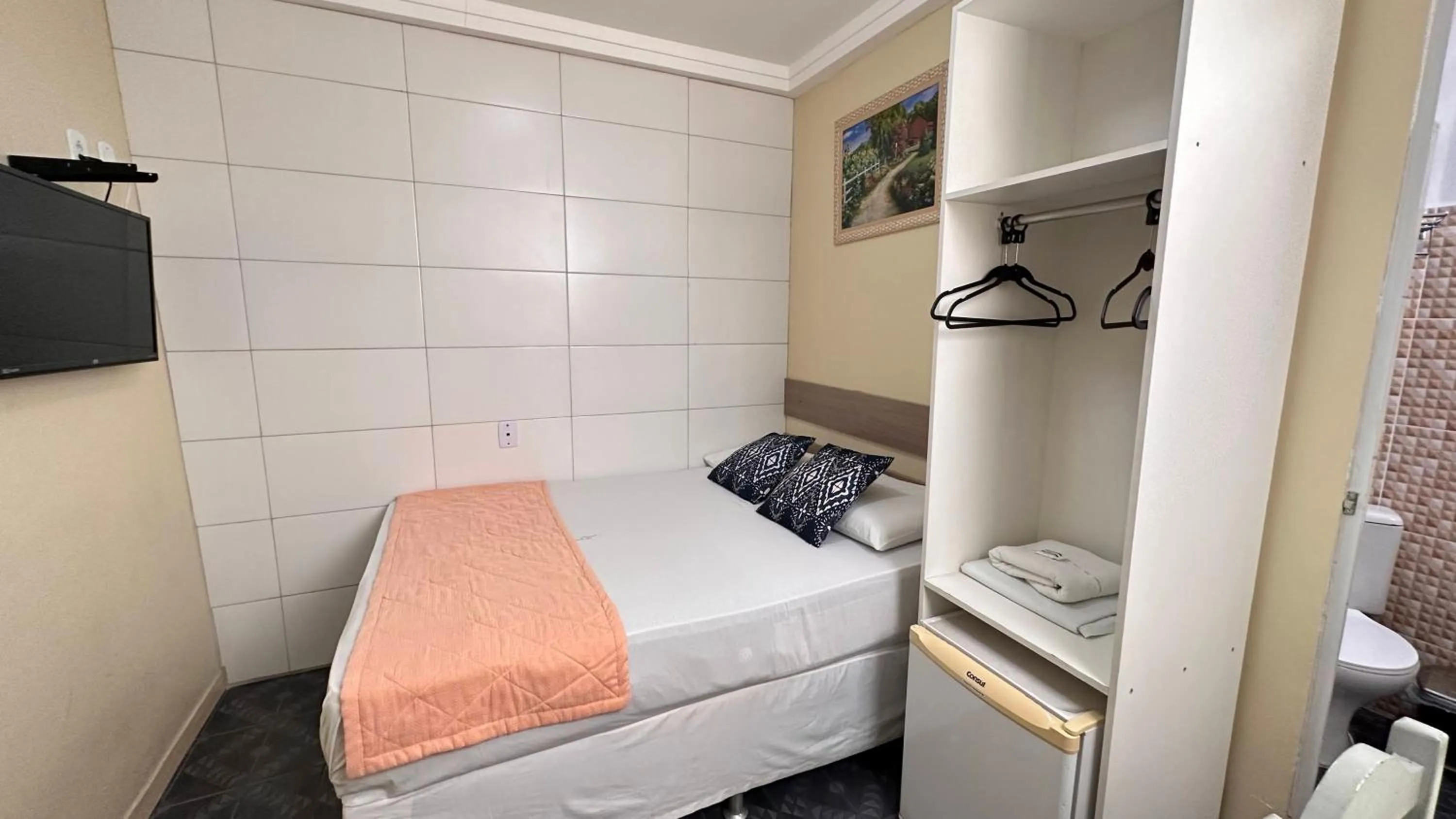 Bed in Pousada São Luiz