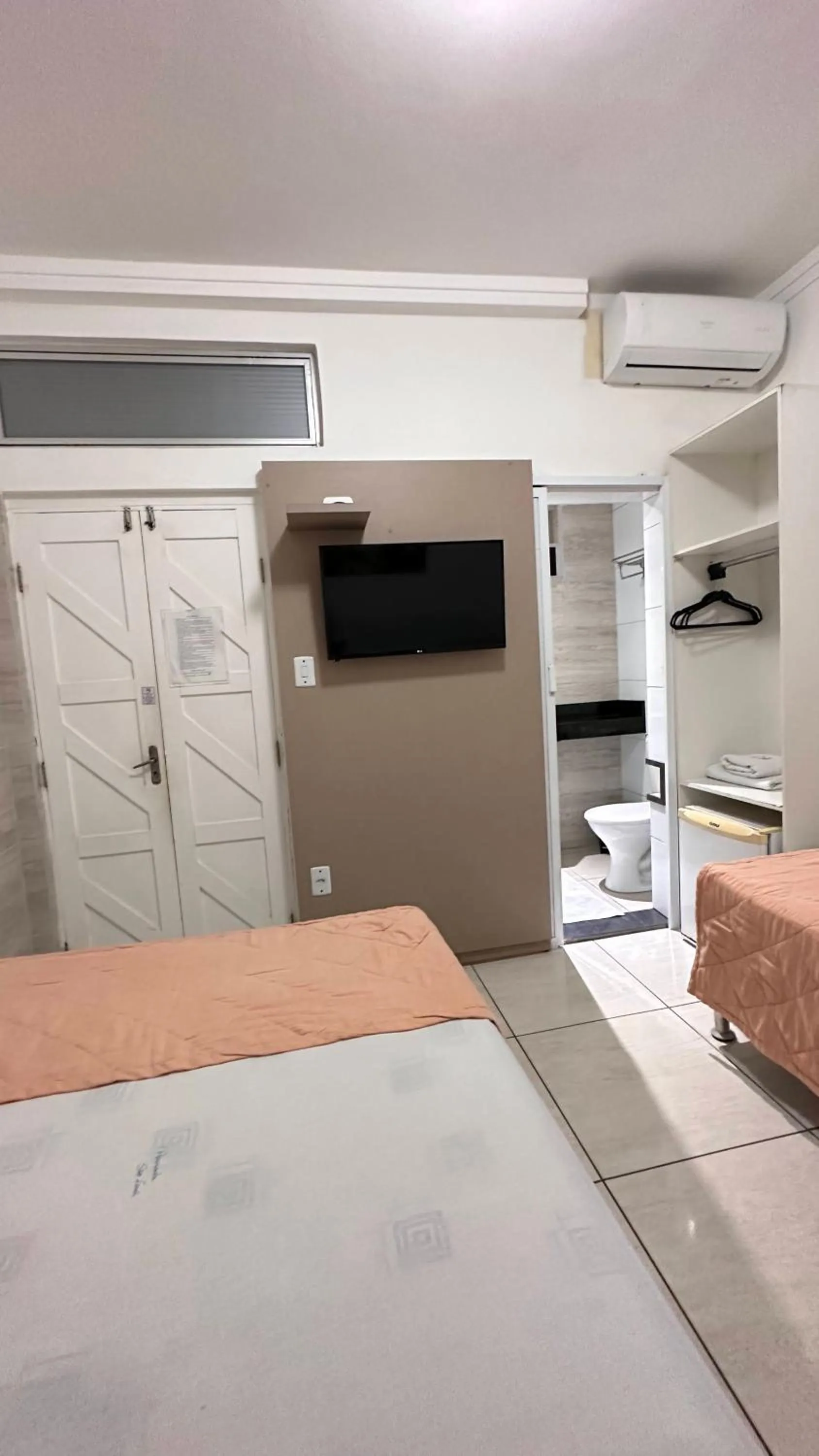 Bed in Pousada São Luiz