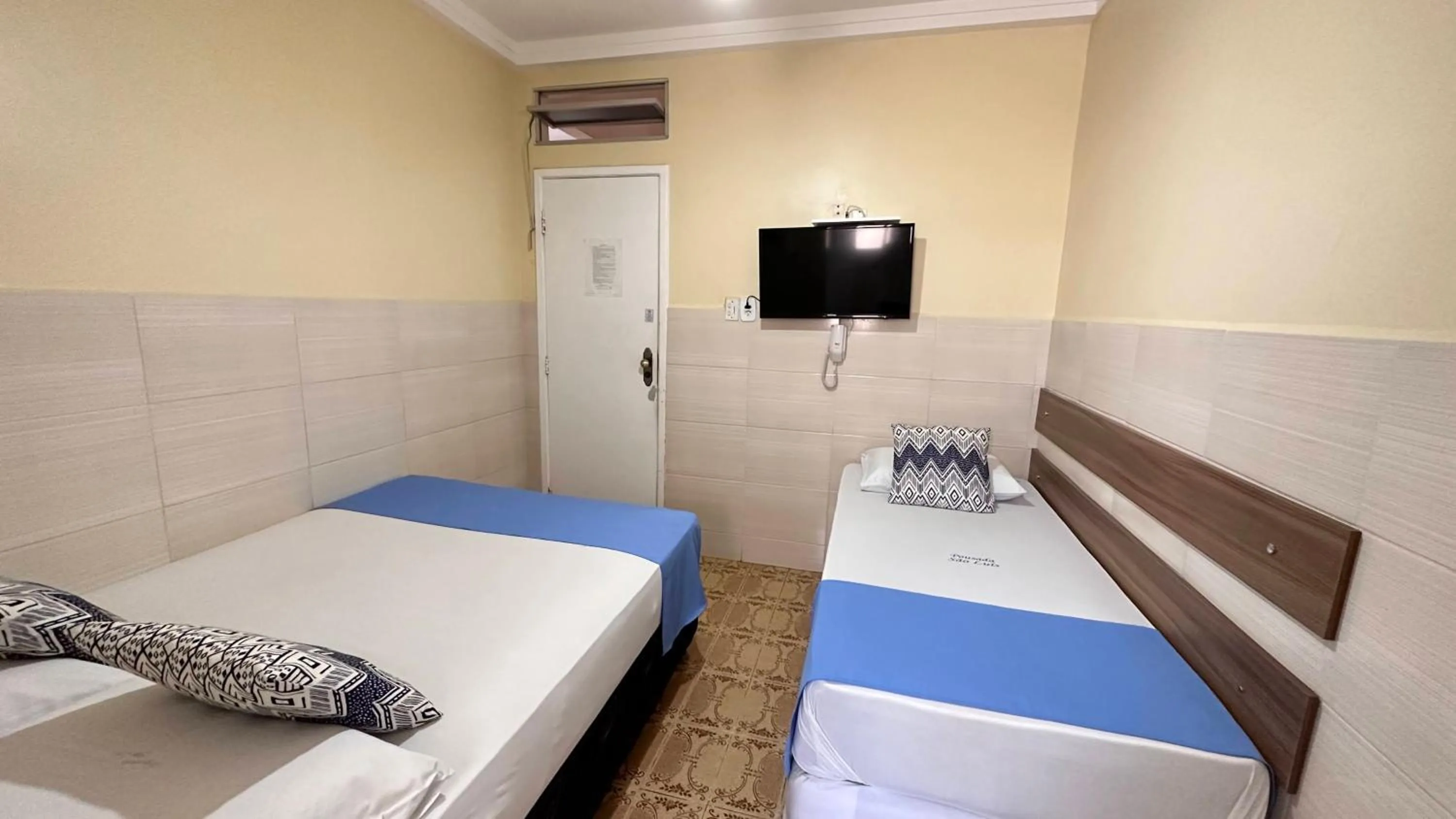 Bed in Pousada São Luiz