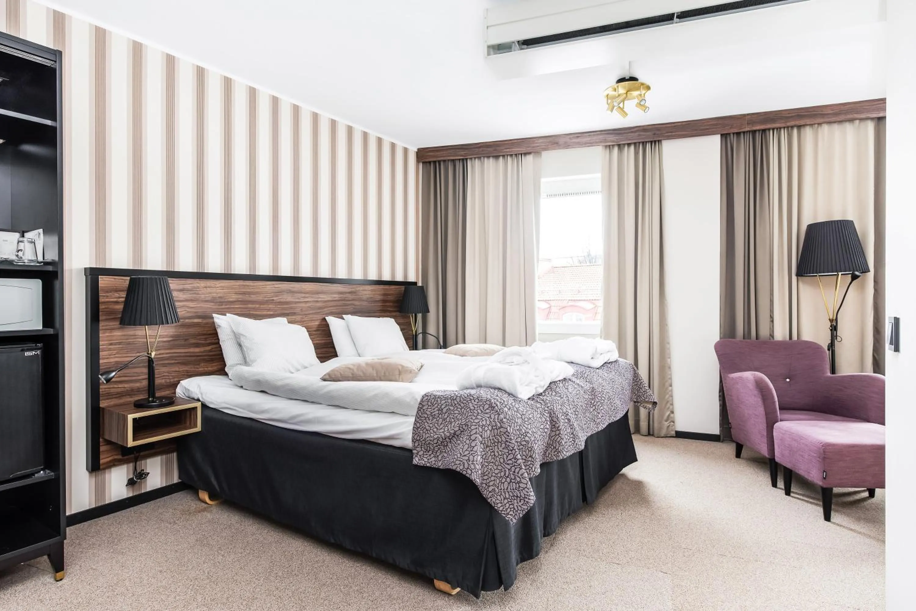 Bed in Clarion Collection Hotel Slottsparken