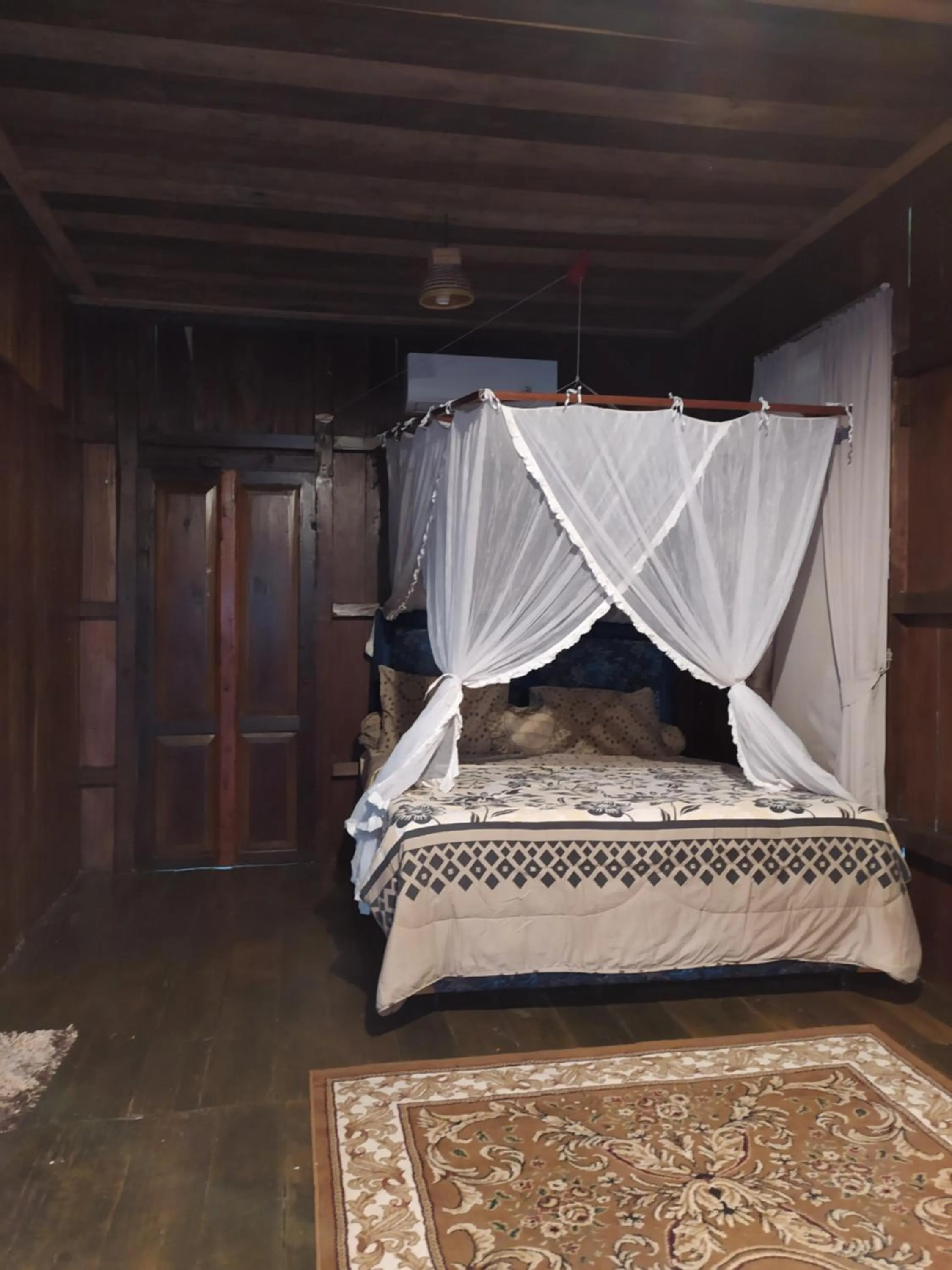 Bed in Rock and Wreck Dive Resort