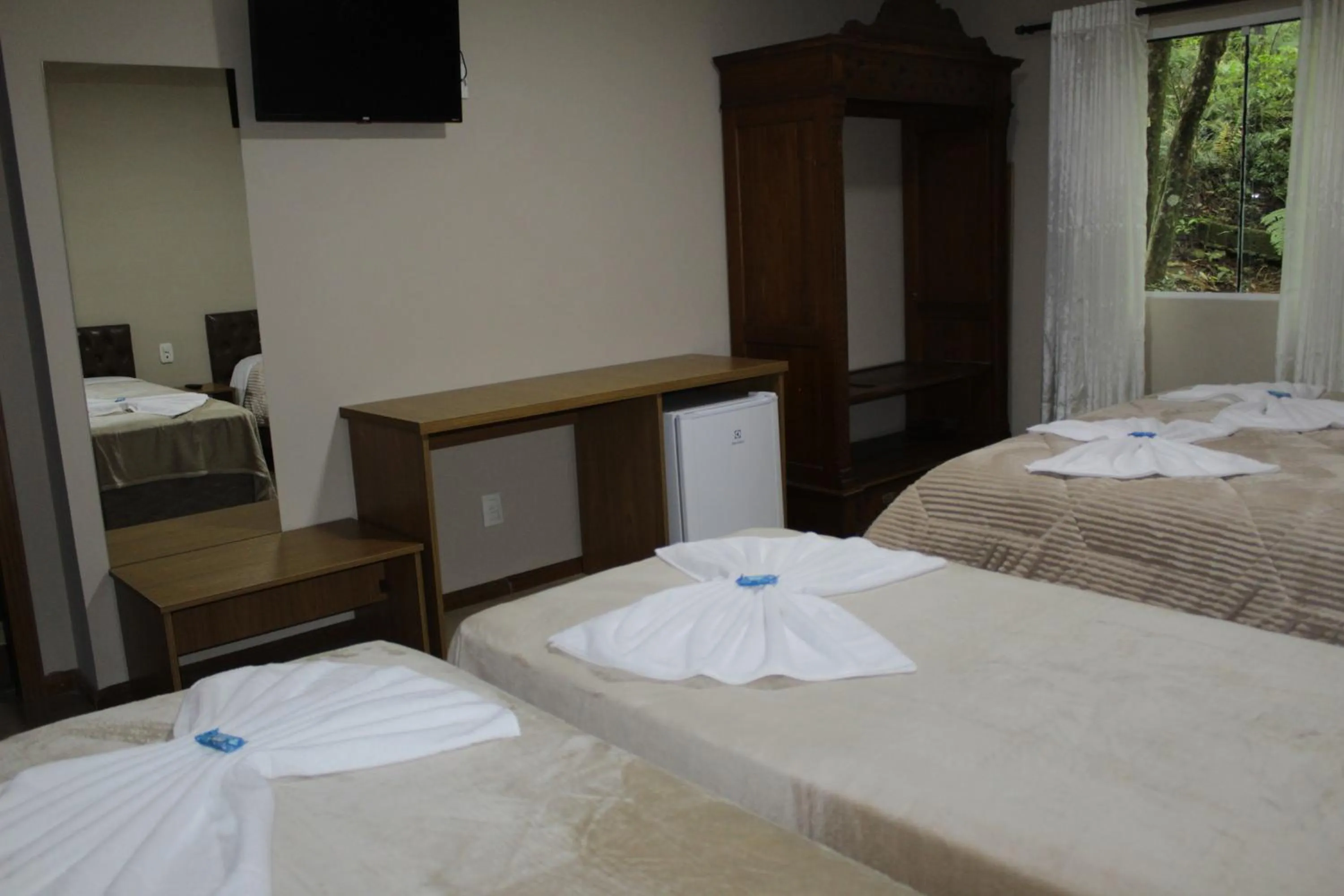 Photo of the whole room, Bed in Pousada Essência Serrana Gramado