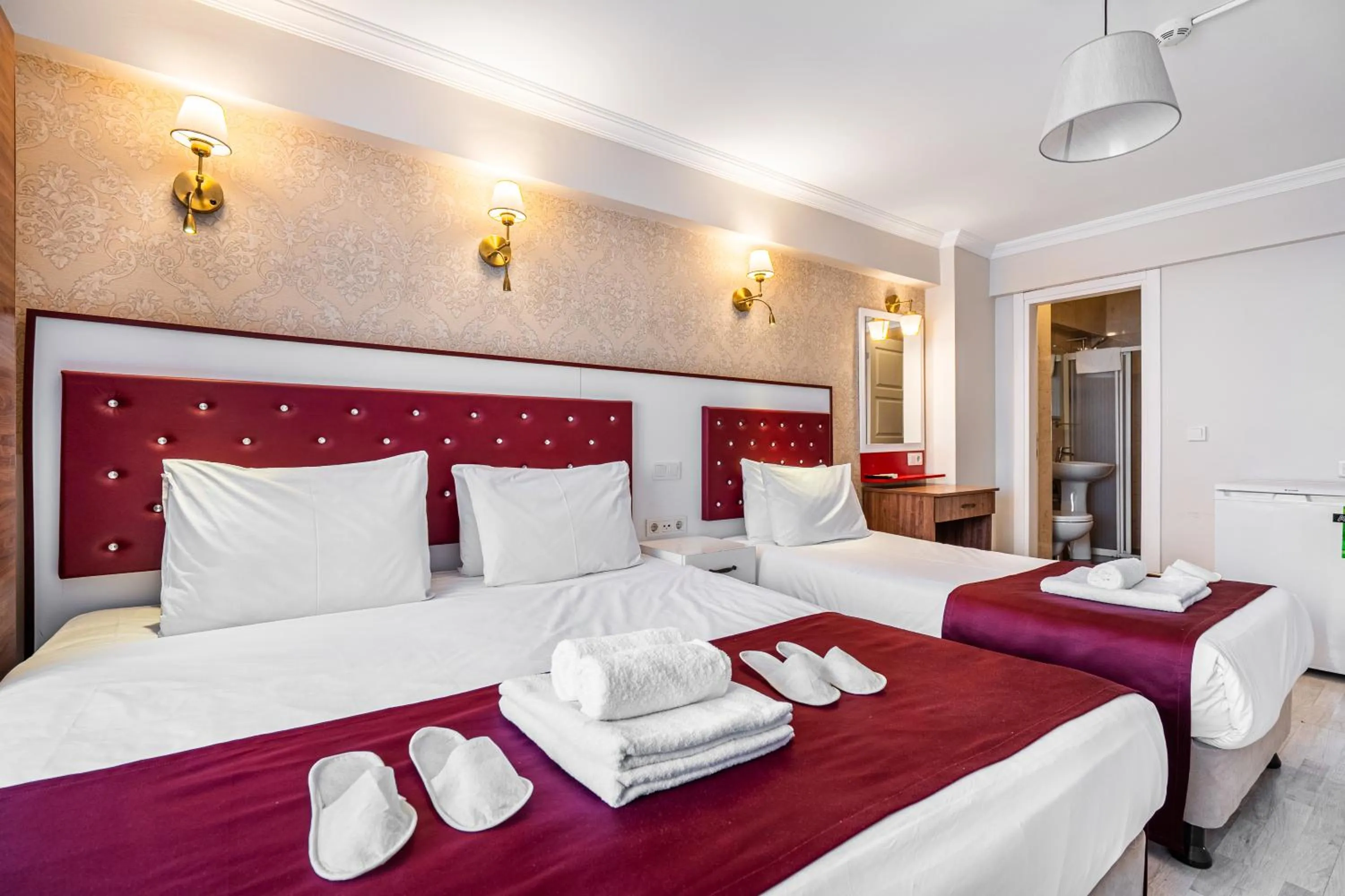 Bed in Cihangir Palace Hotel