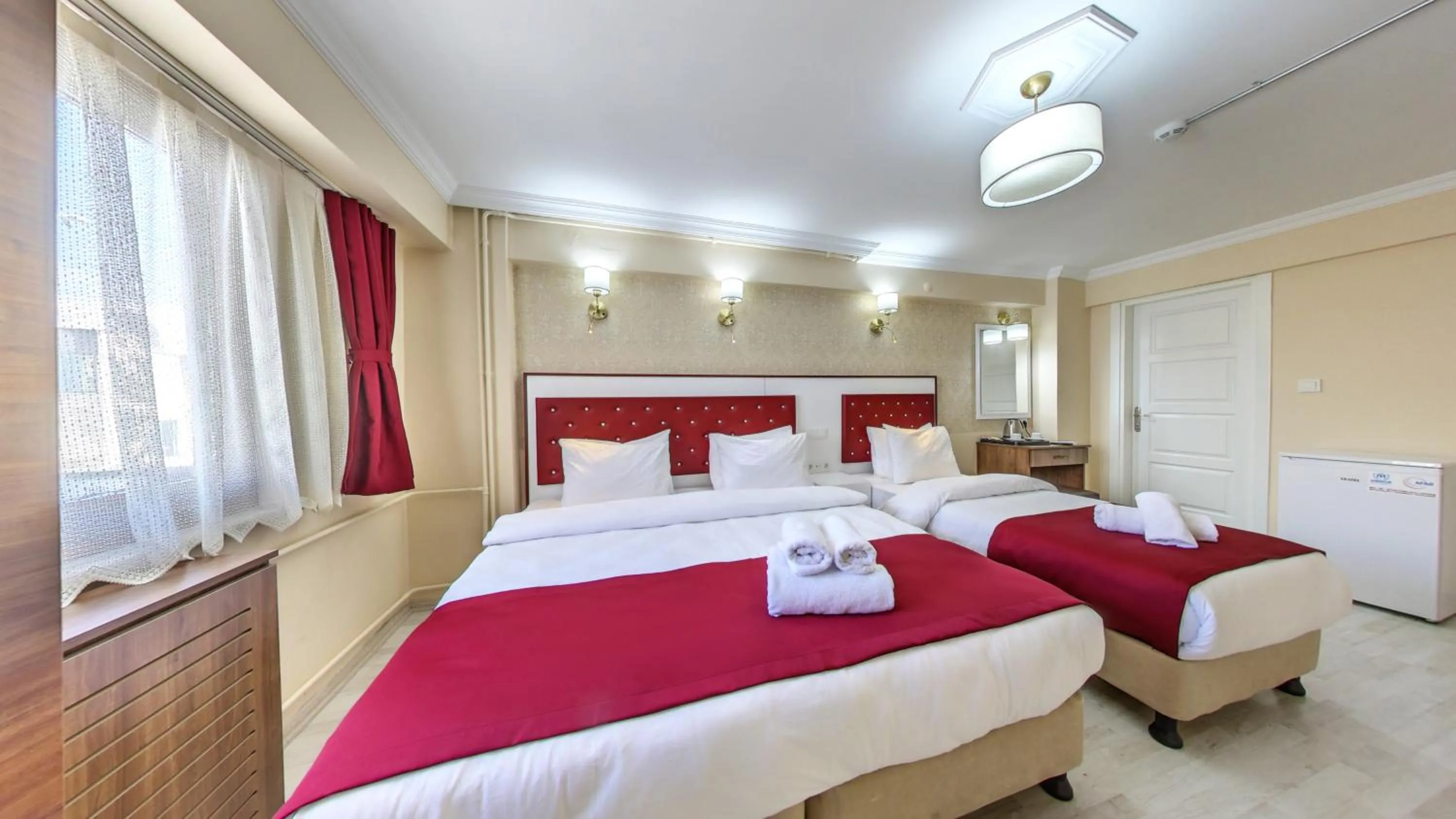 Bed in Cihangir Palace Hotel