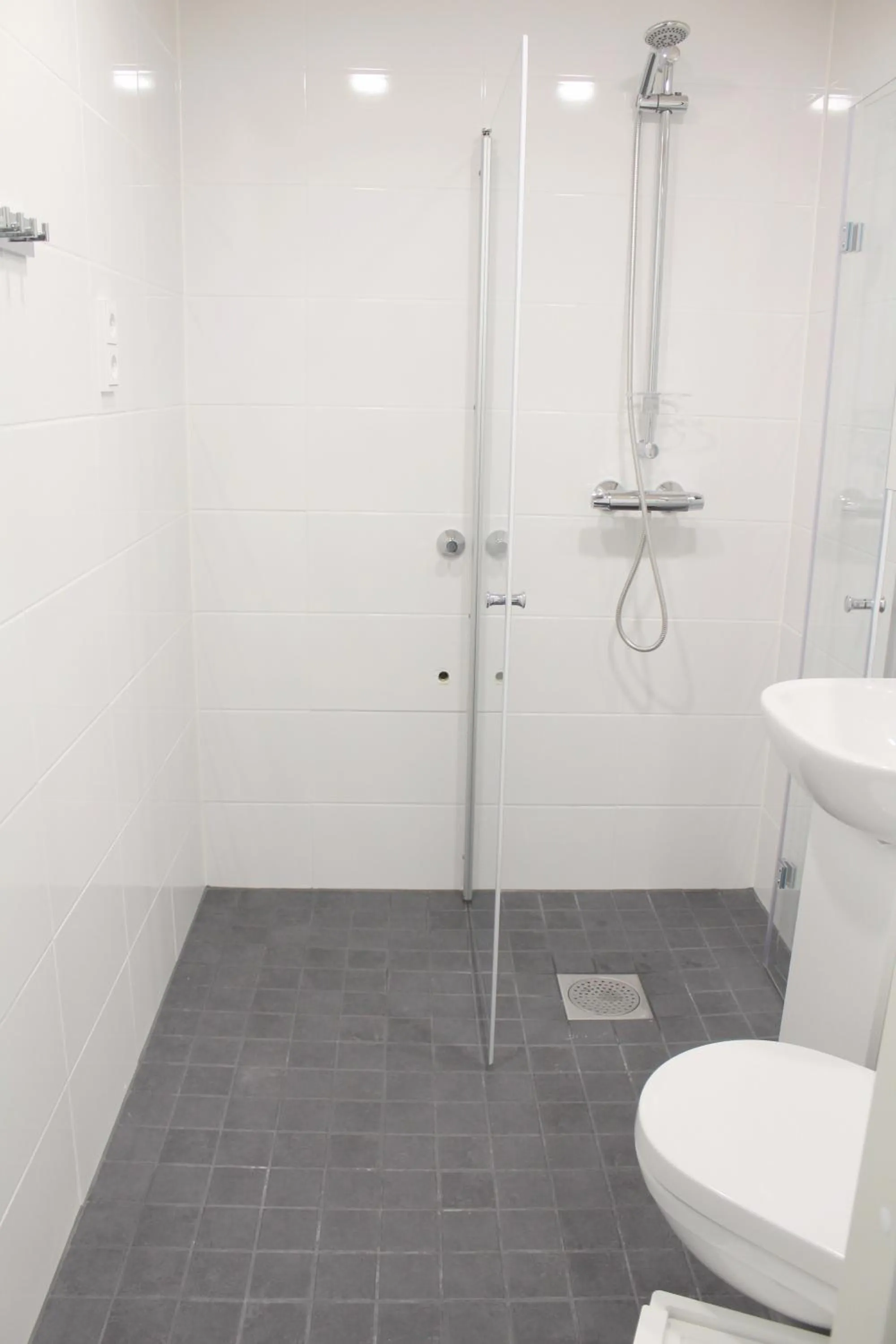 Shower in Forenom Serviced Apartments Rovaniemi Valtakatu