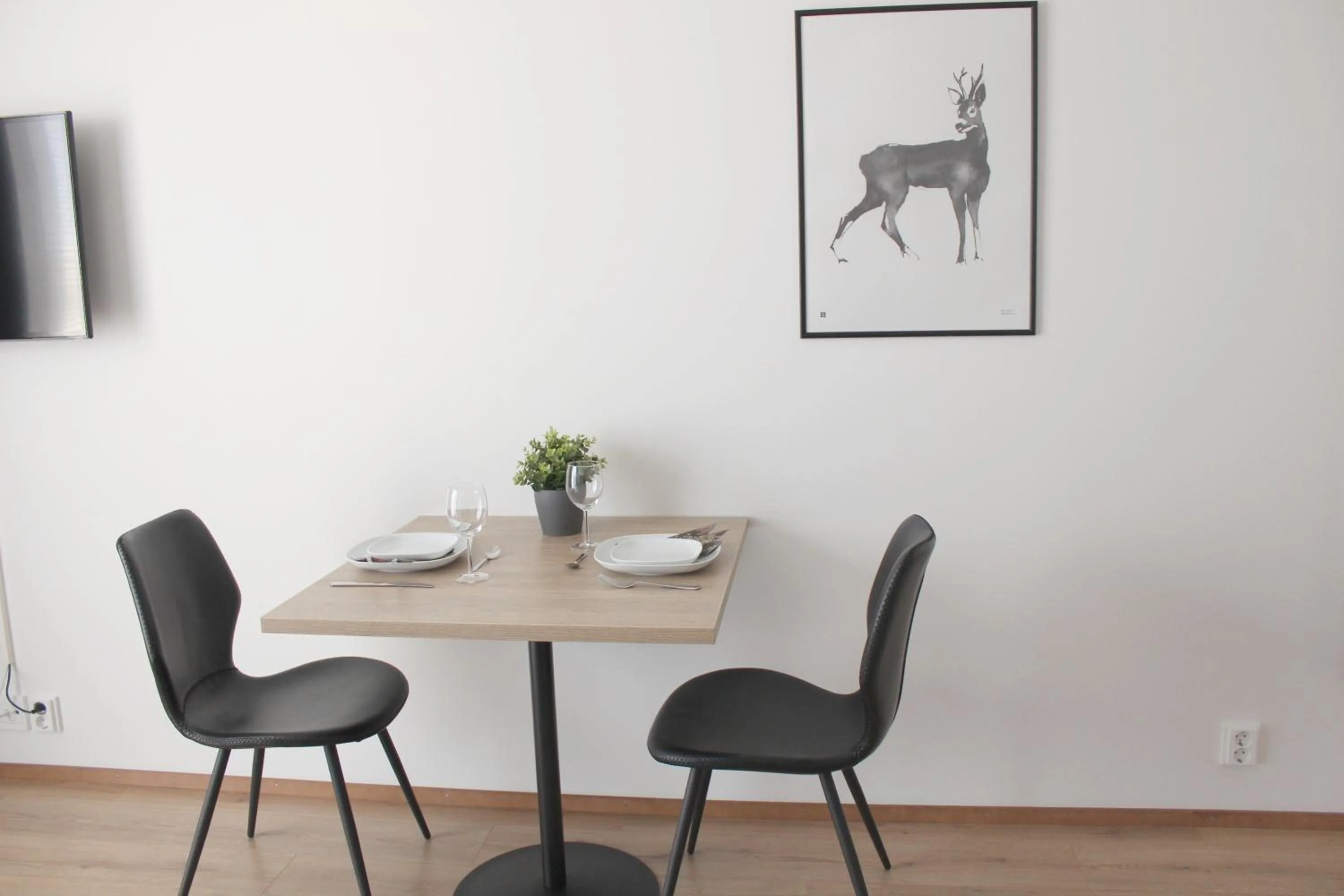 Dining area in Forenom Serviced Apartments Rovaniemi Valtakatu