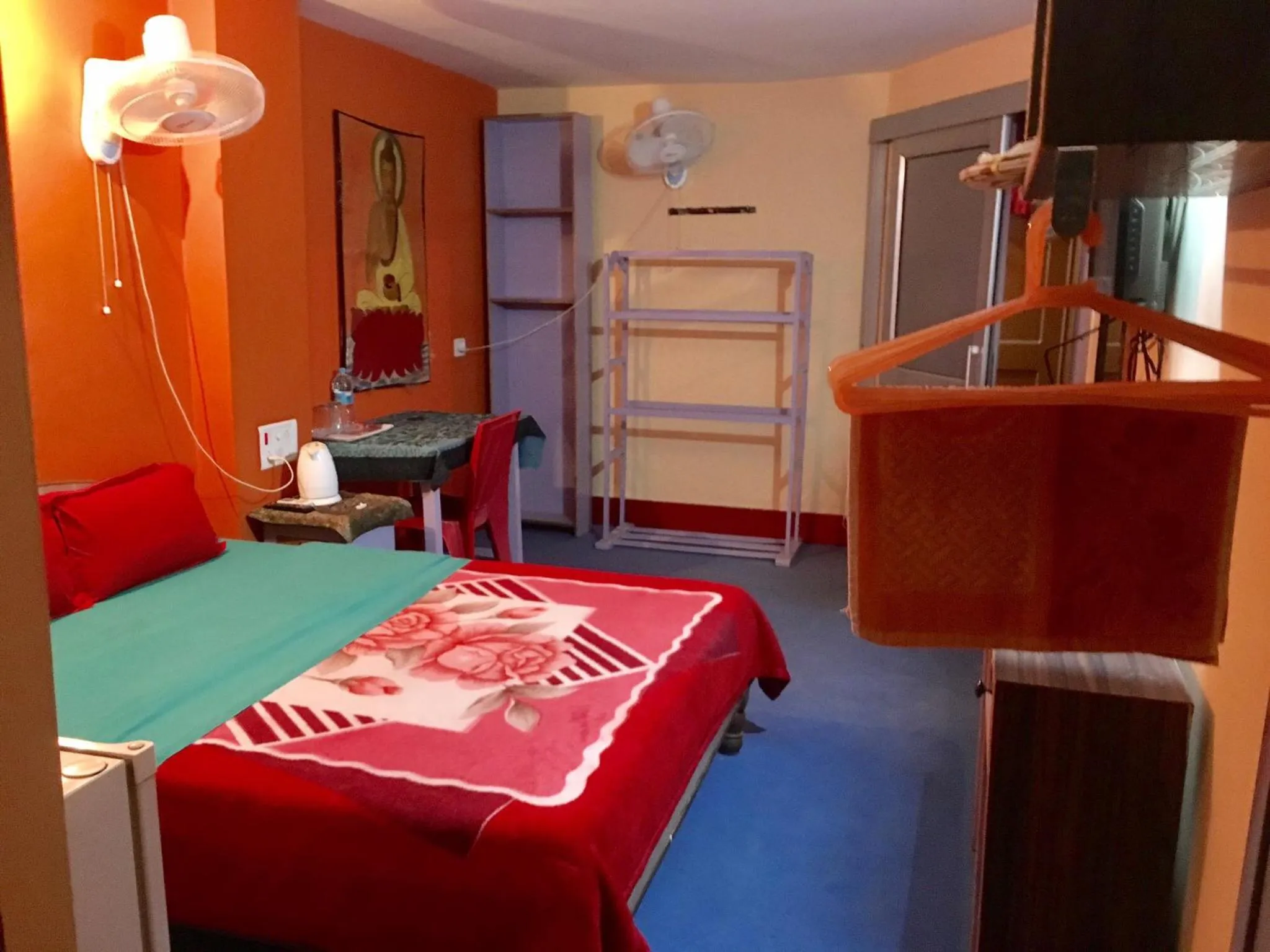 Photo of the whole room, Bed in Kundanbazar Guest House