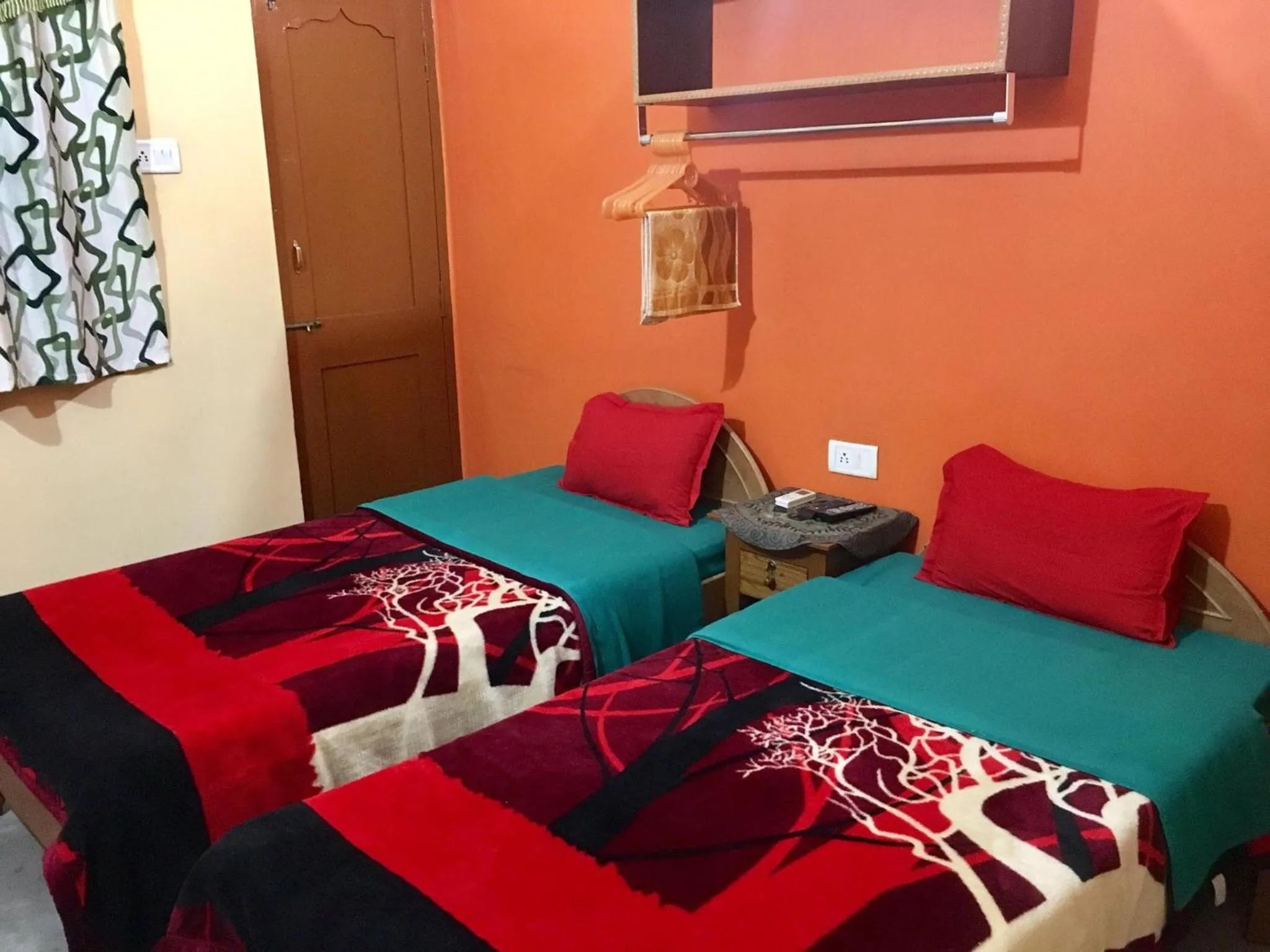 Photo of the whole room, Bed in Kundanbazar Guest House