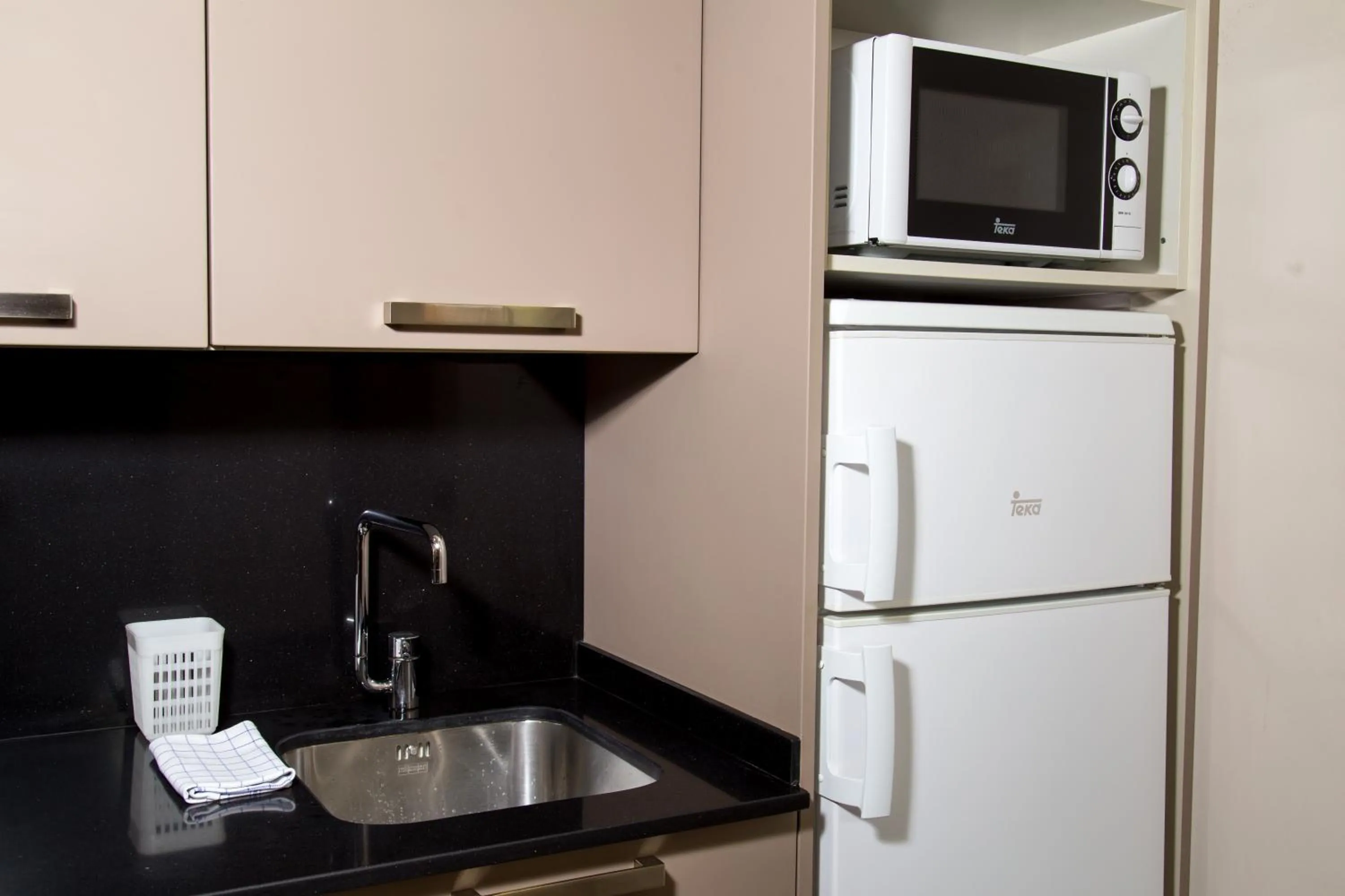 Kitchen or kitchenette in Pierre & Vacances Barcelona Sants