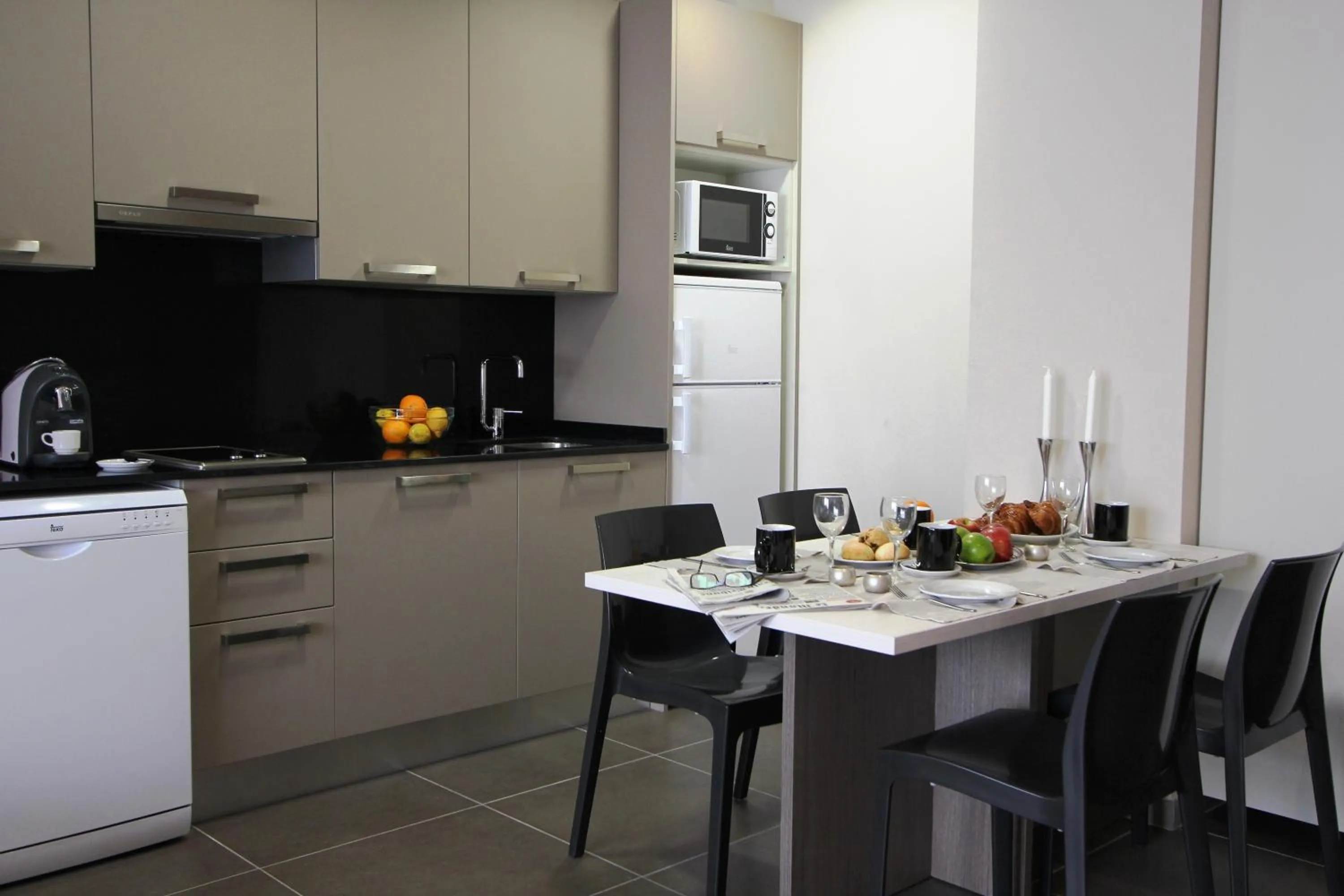 Kitchen or kitchenette in Pierre & Vacances Barcelona Sants