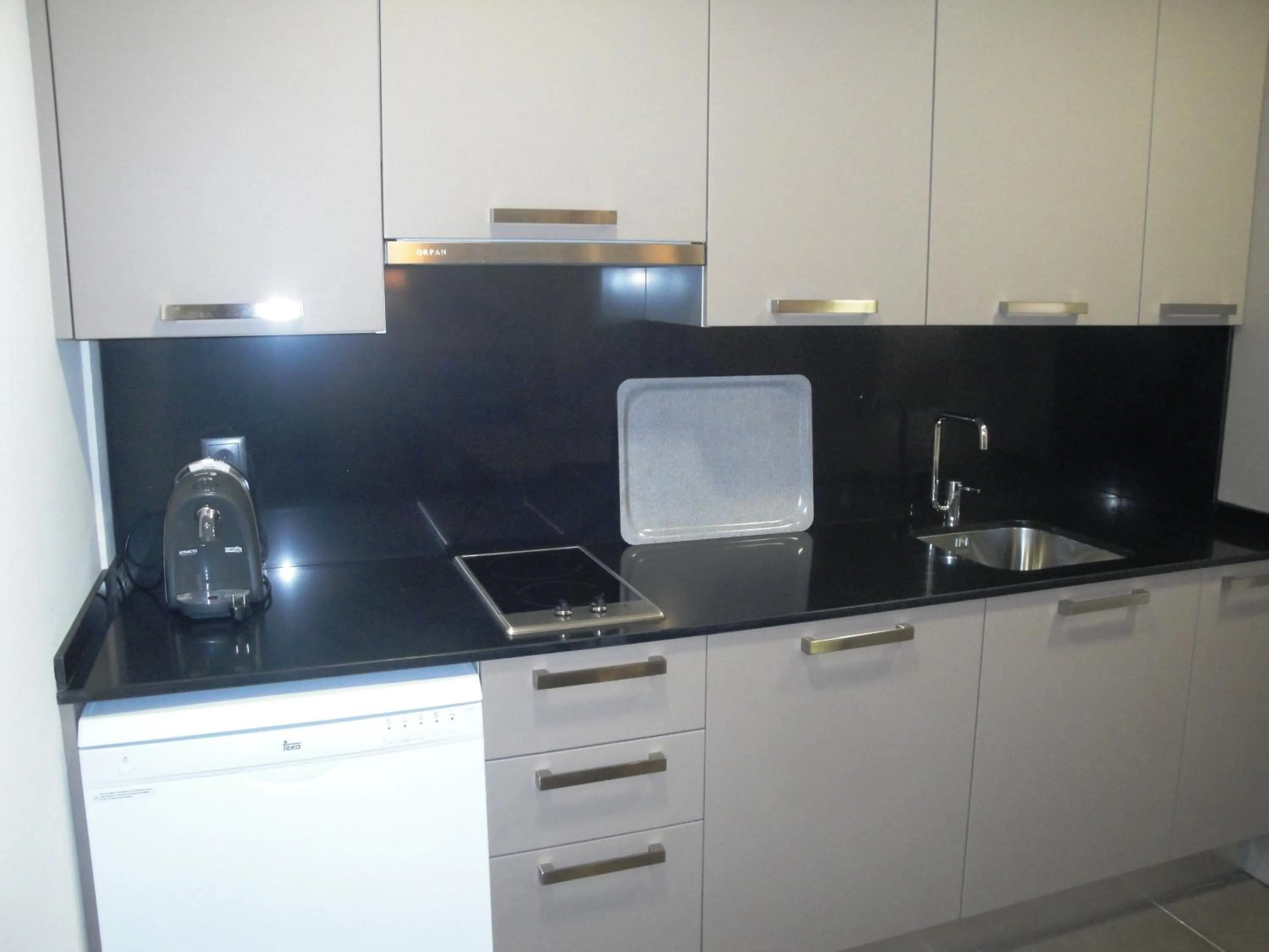 Kitchen or kitchenette in Pierre & Vacances Barcelona Sants