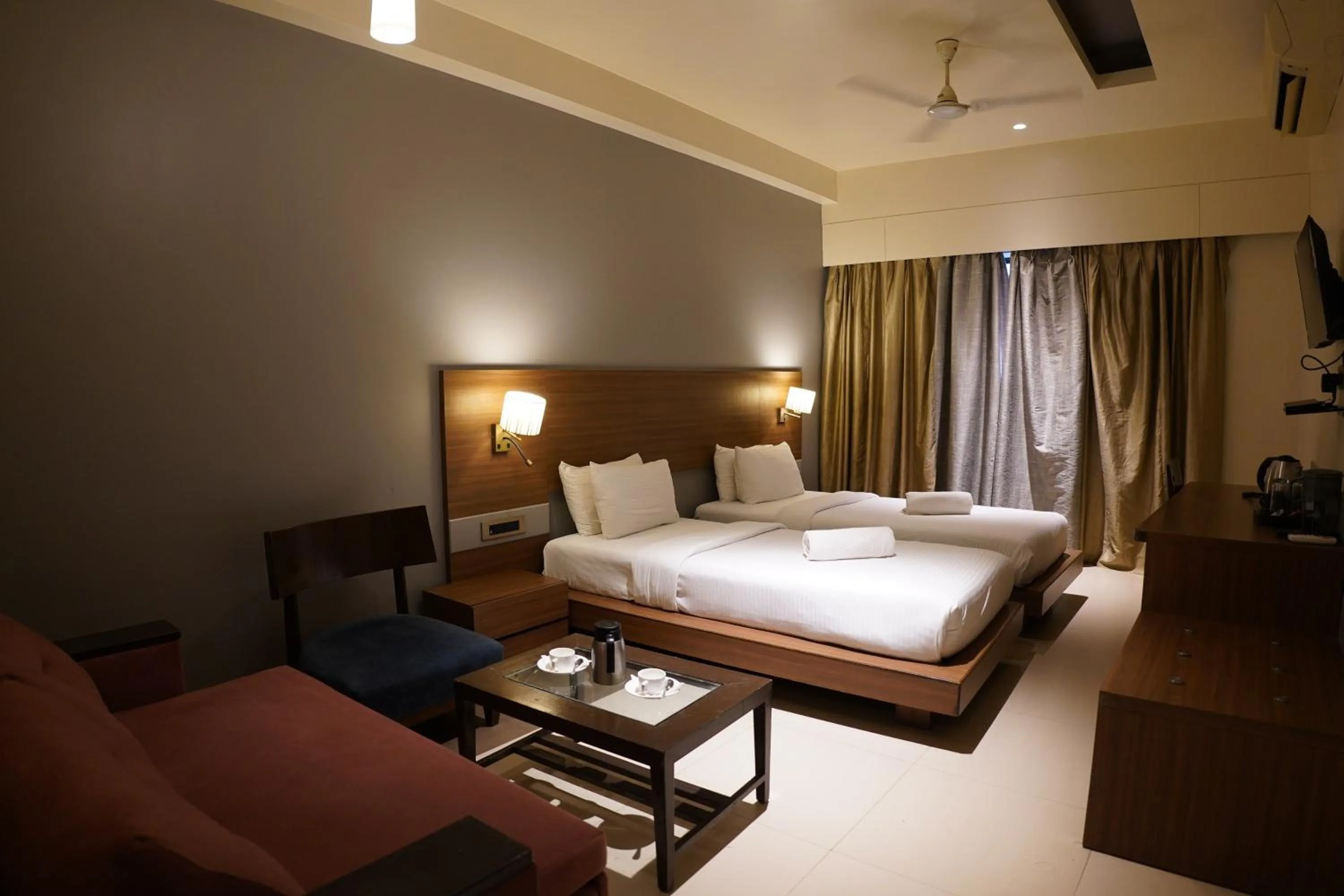 Photo of the whole room, Bed in Hotel Sadanand Regency - Newly Renovated