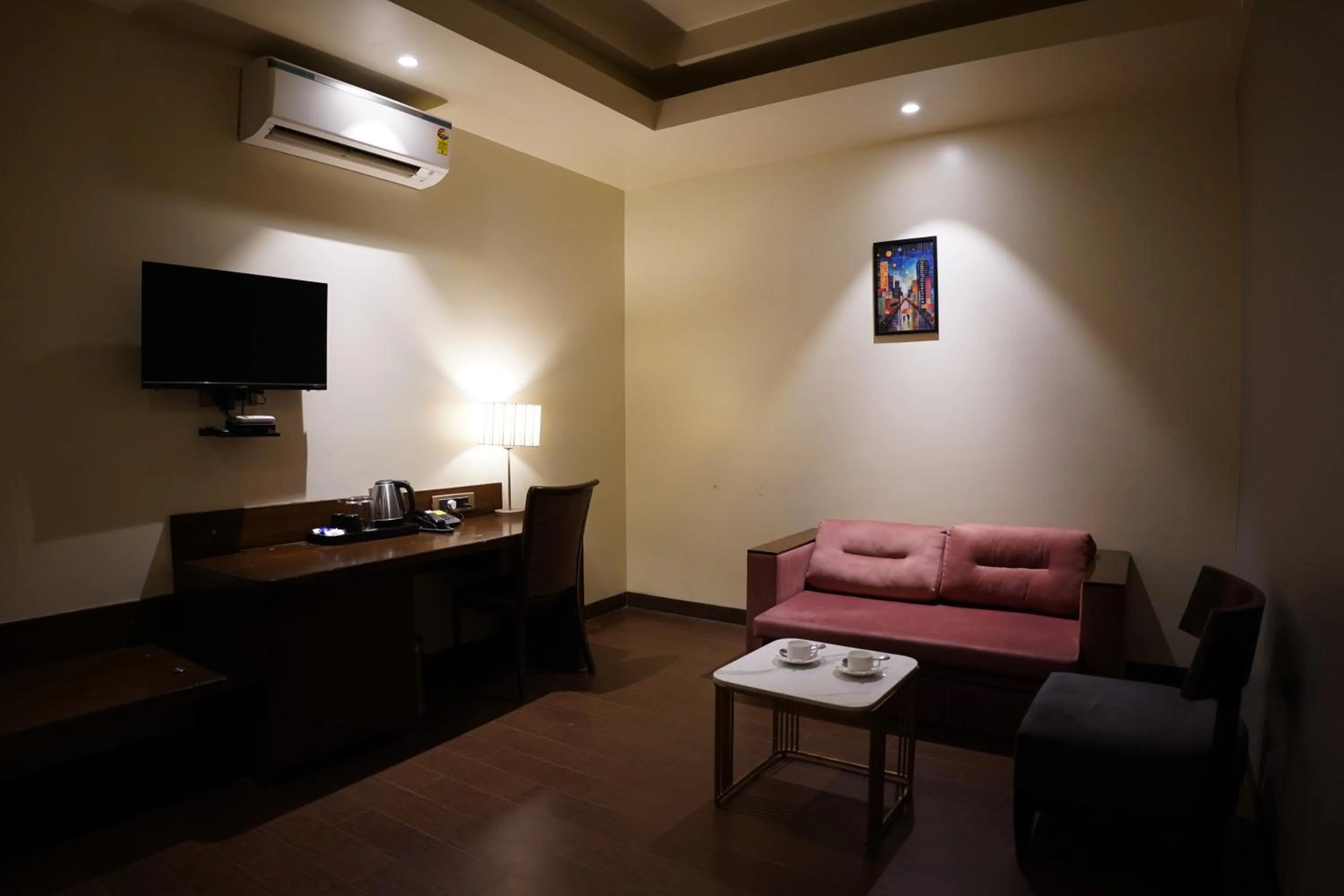Living room in Hotel Sadanand Regency - Newly Renovated