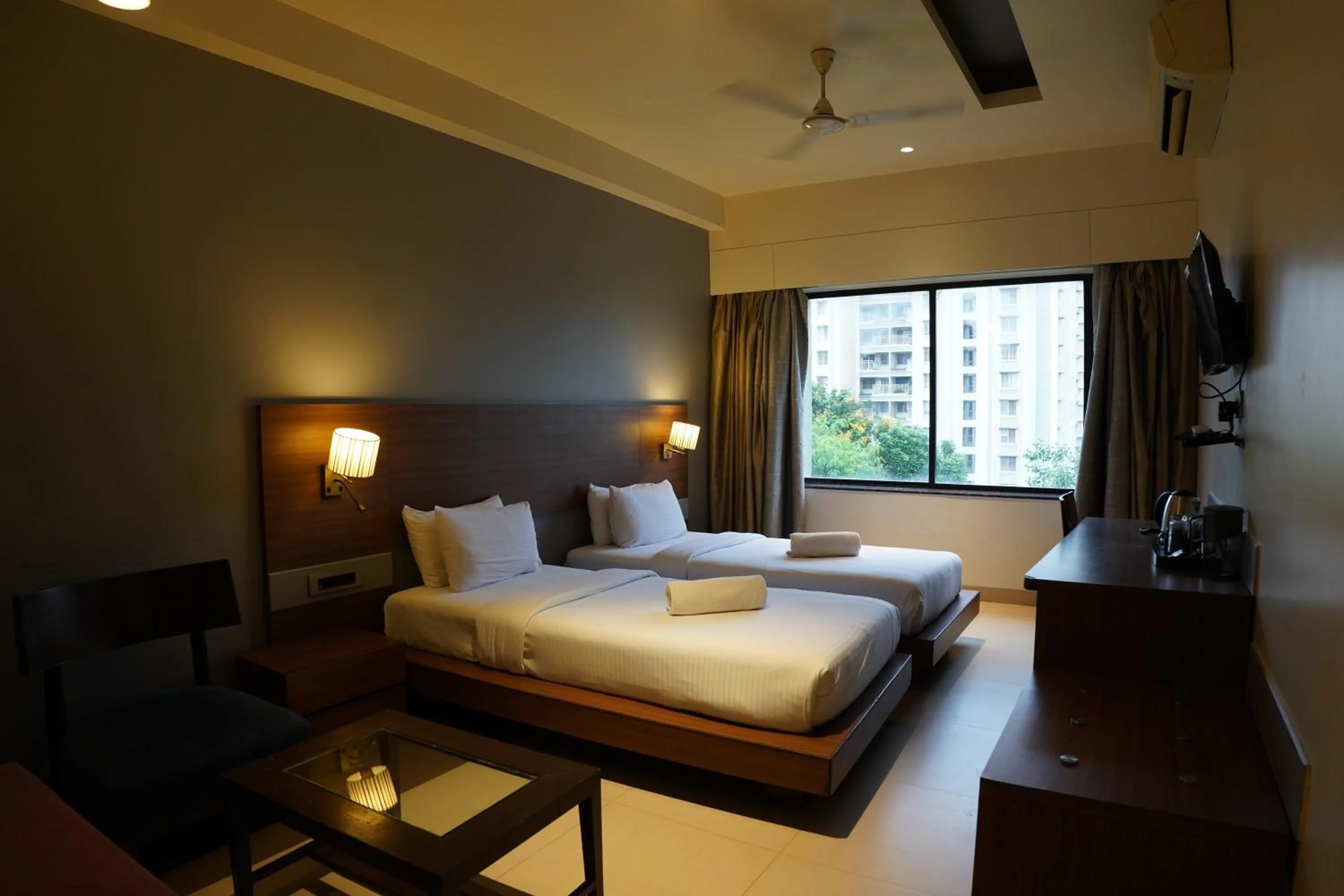 Photo of the whole room, Bed in Hotel Sadanand Regency - Newly Renovated
