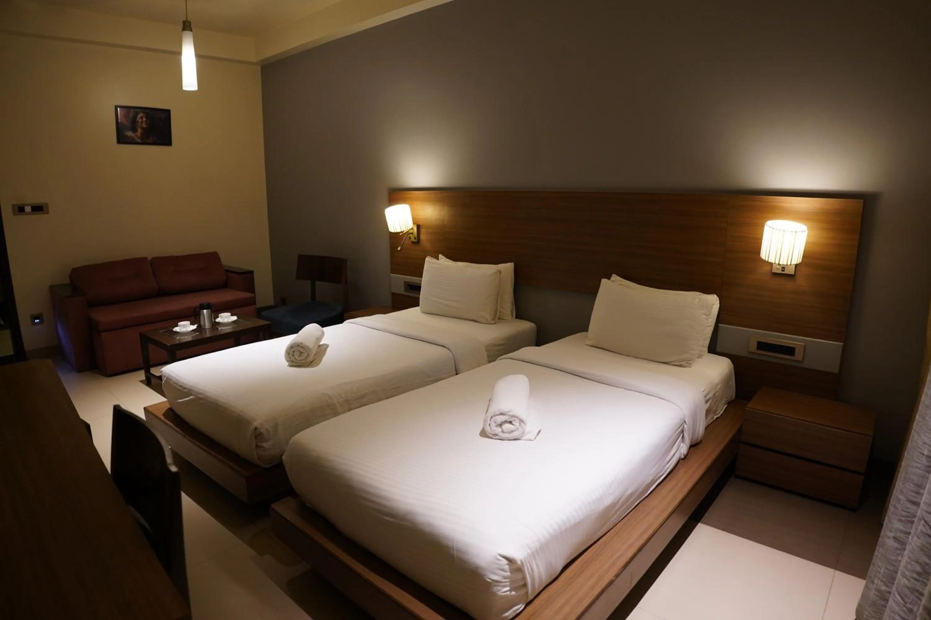 Bedroom, Bed in Hotel Sadanand Regency - Newly Renovated