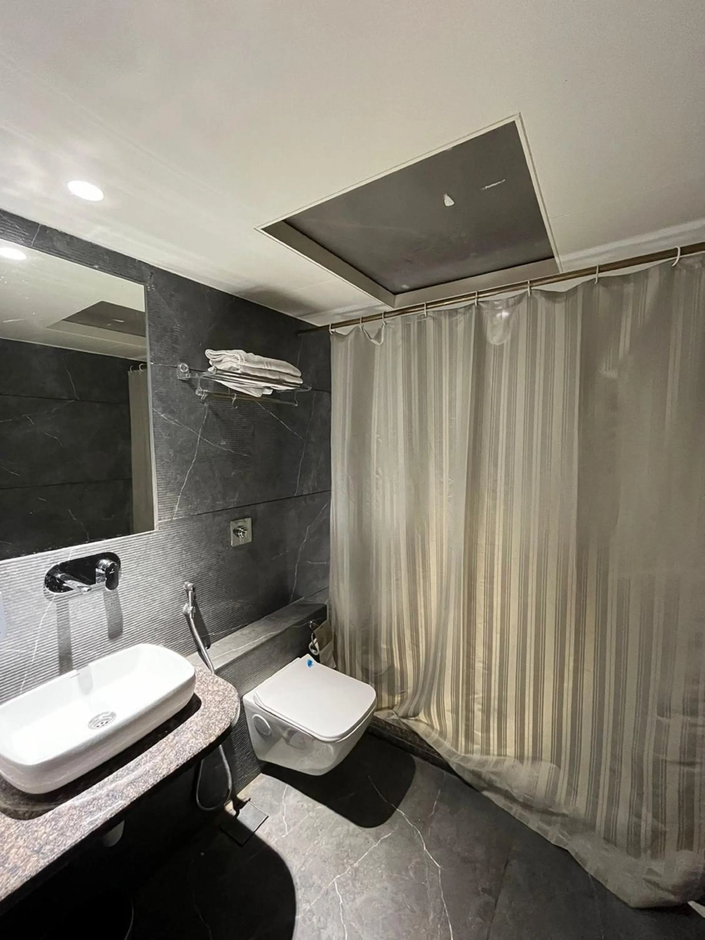 Bathroom in Hotel Sadanand Regency - Newly Renovated