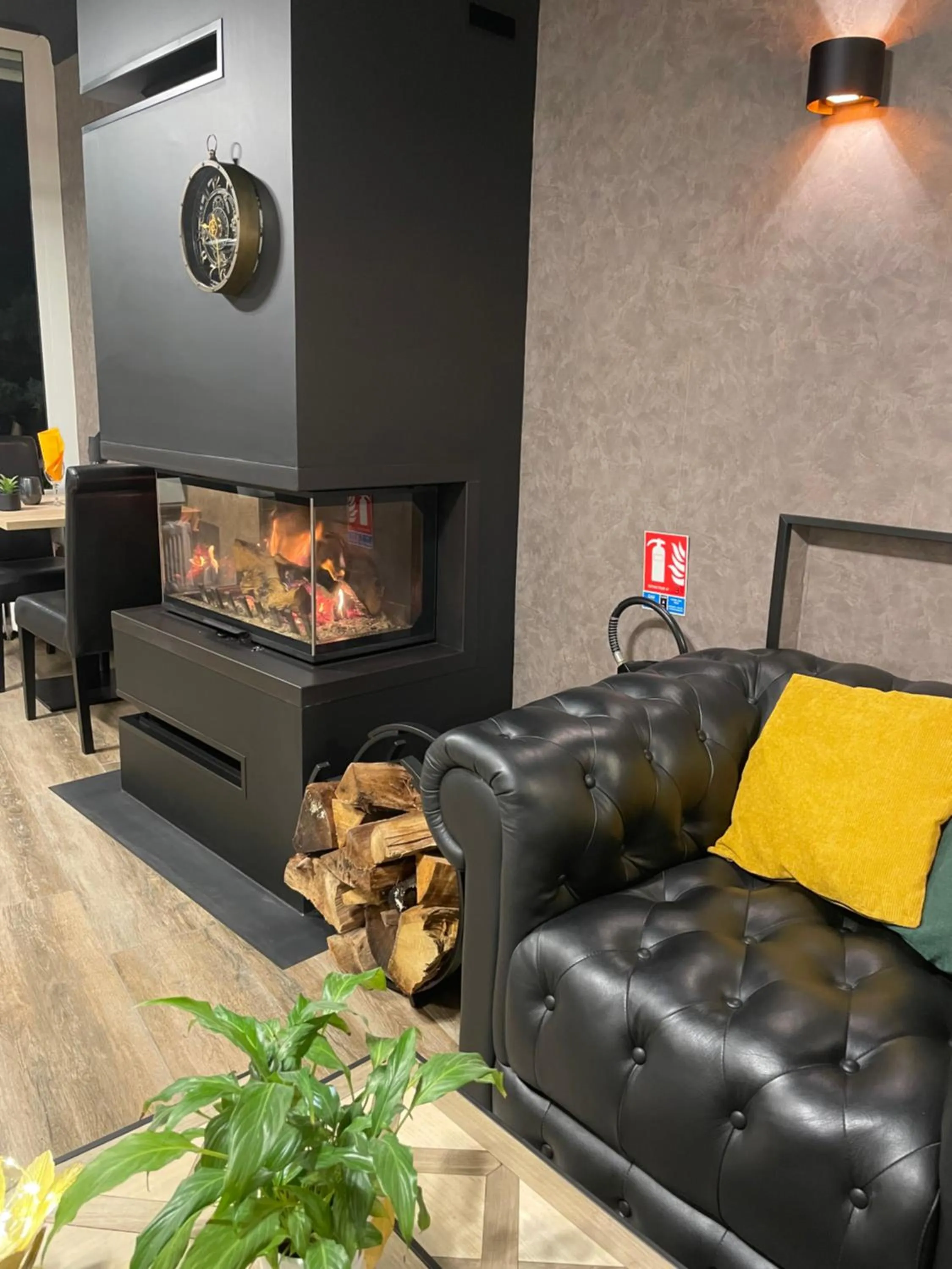 Seating area in Logis hôtel Aux Berges de l'Aveyron