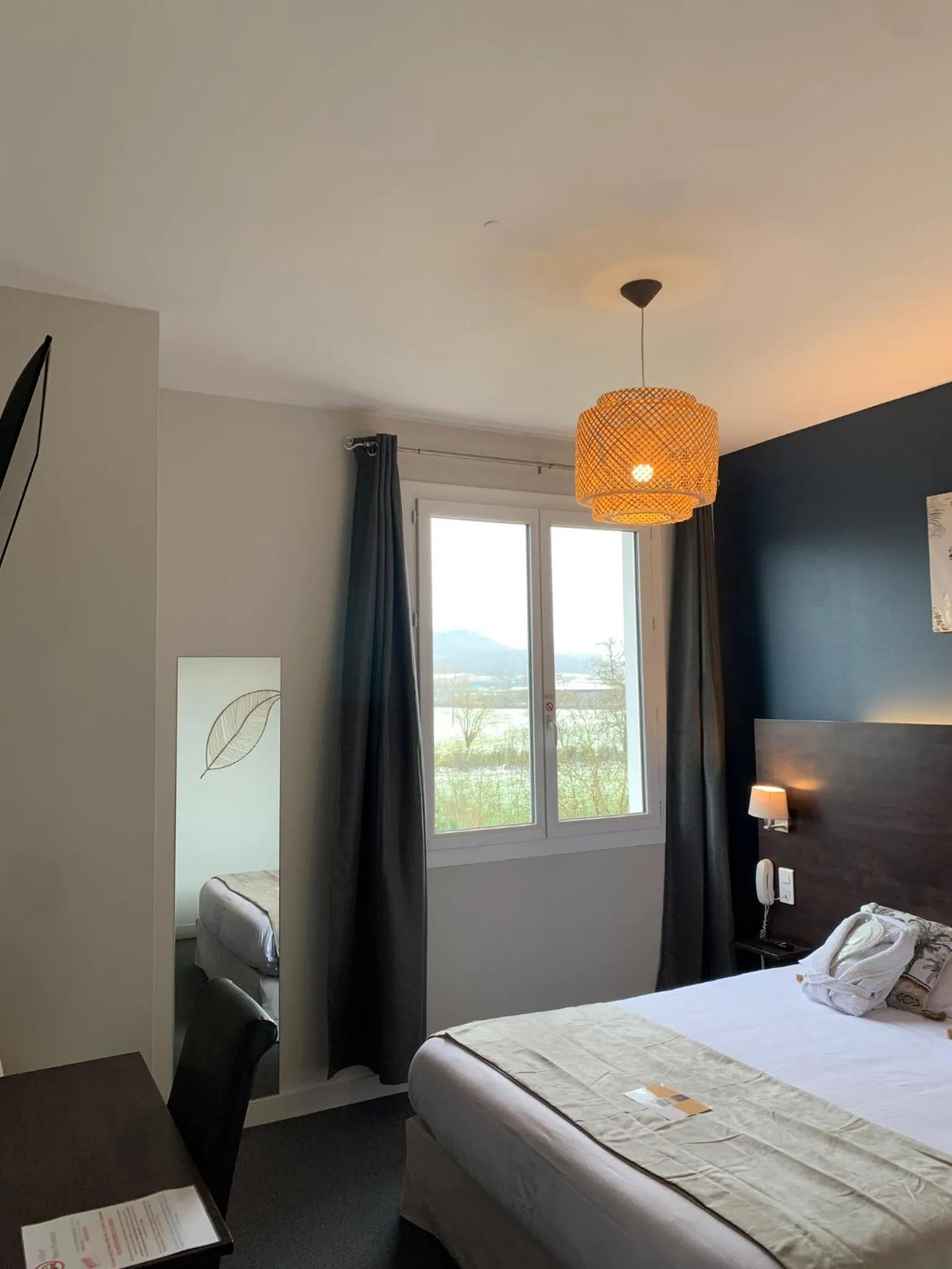 Photo of the whole room, Bed in Logis hôtel Aux Berges de l'Aveyron