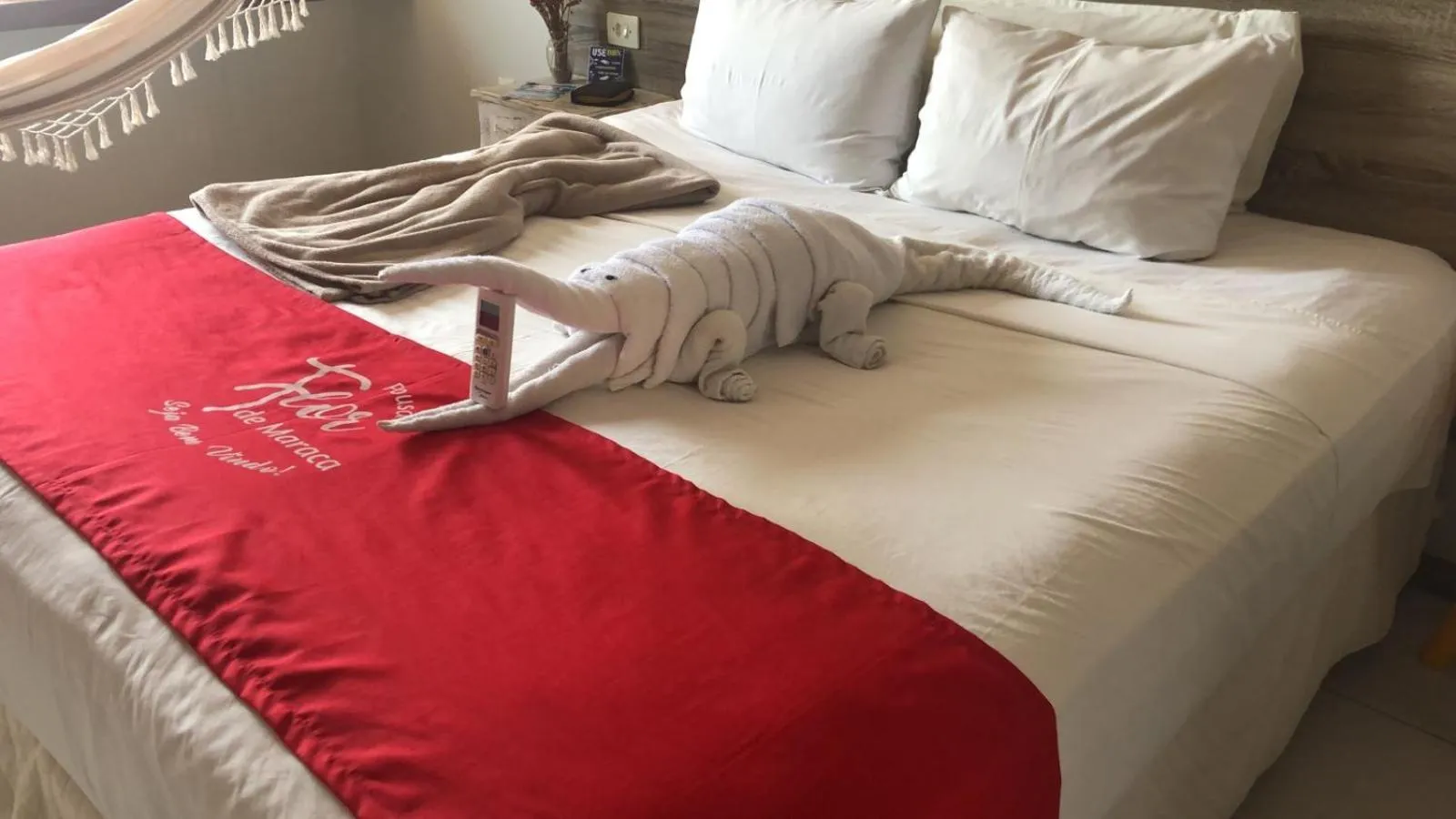 towels, Bed in Pousada Flor de Maraca