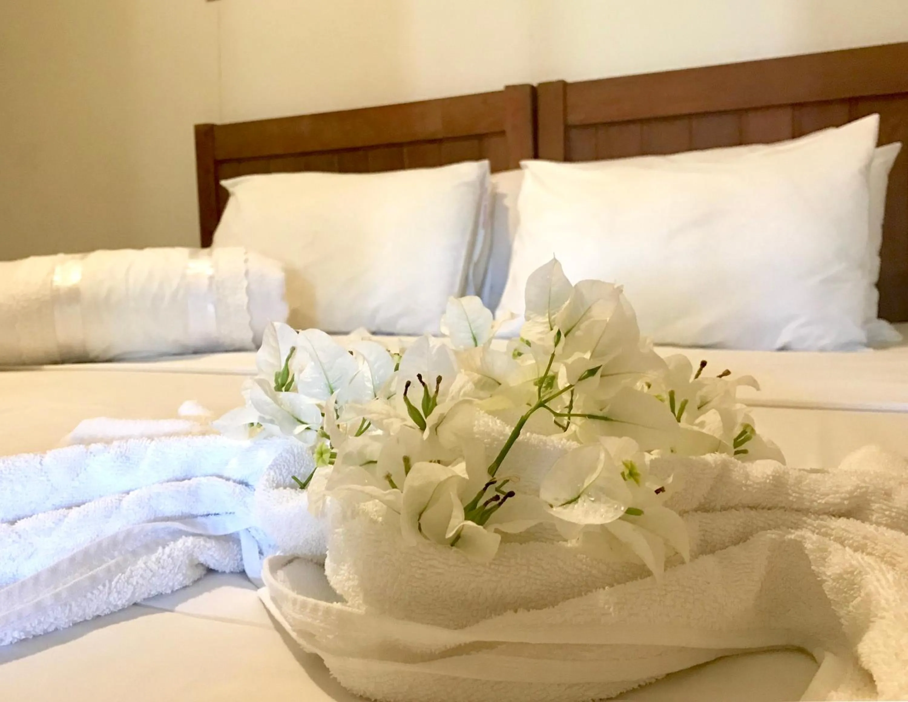 Bed in Pousada Flor de Maraca