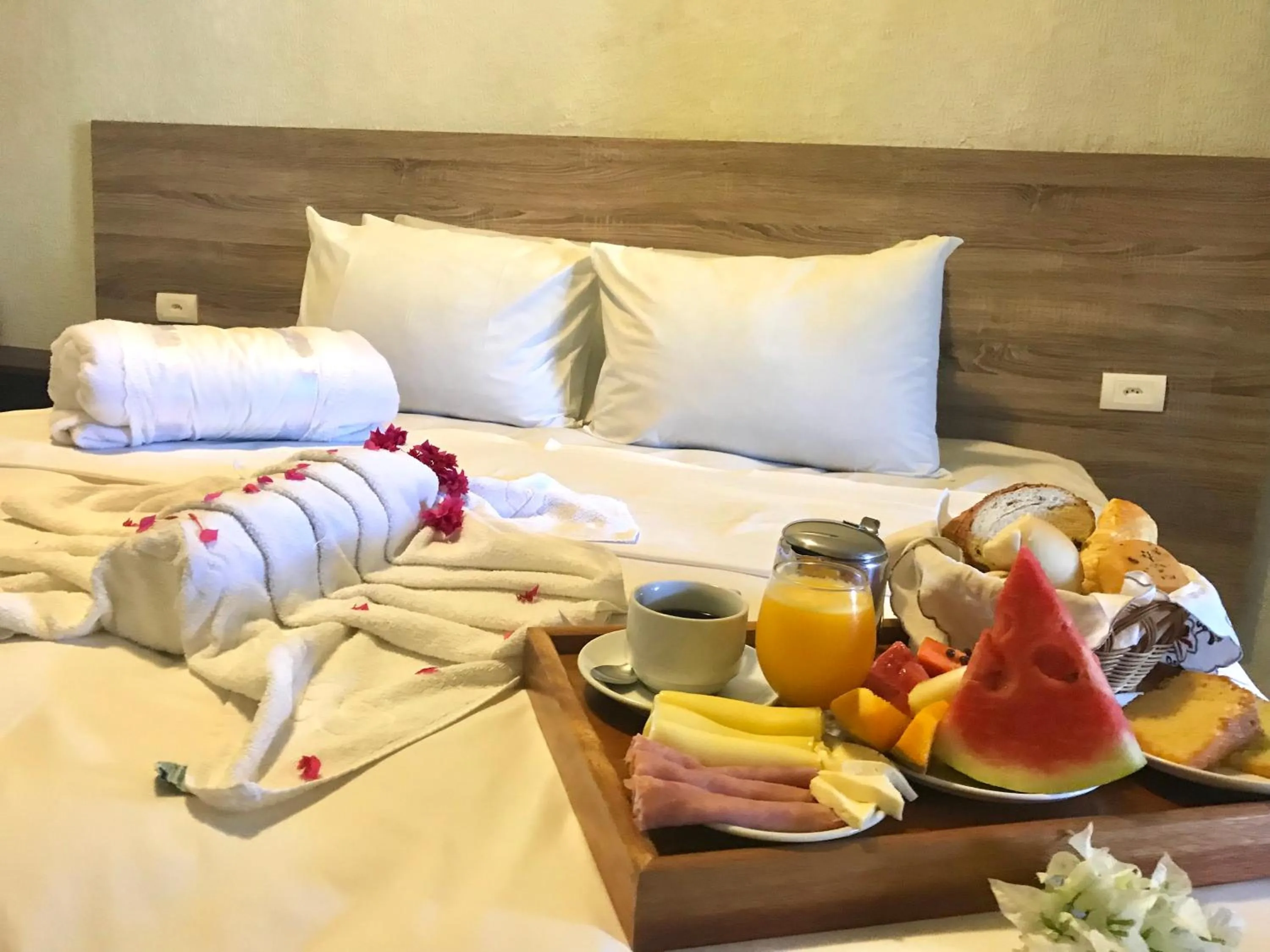 Bed in Pousada Flor de Maraca