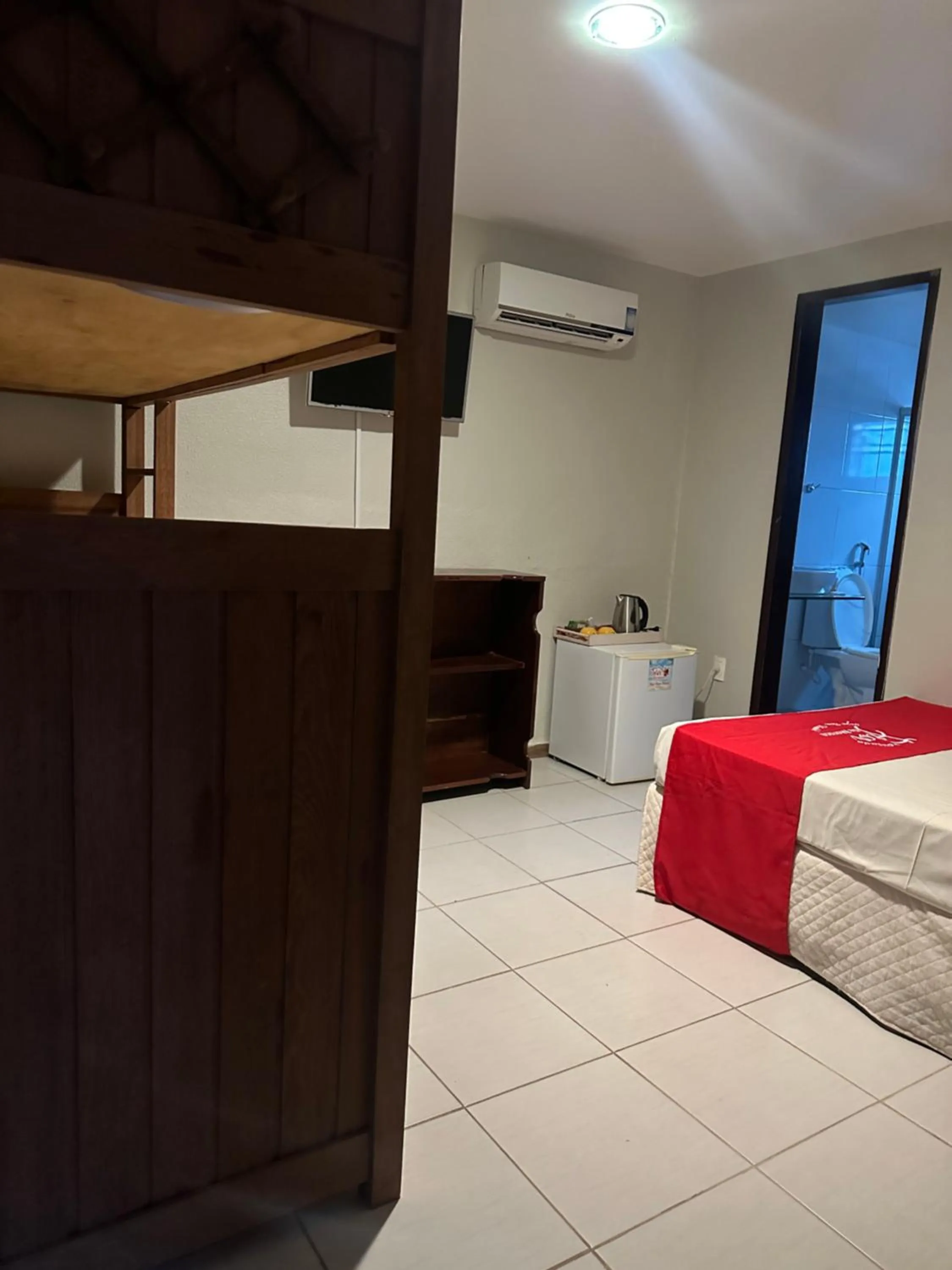 Bed in Pousada Flor de Maraca