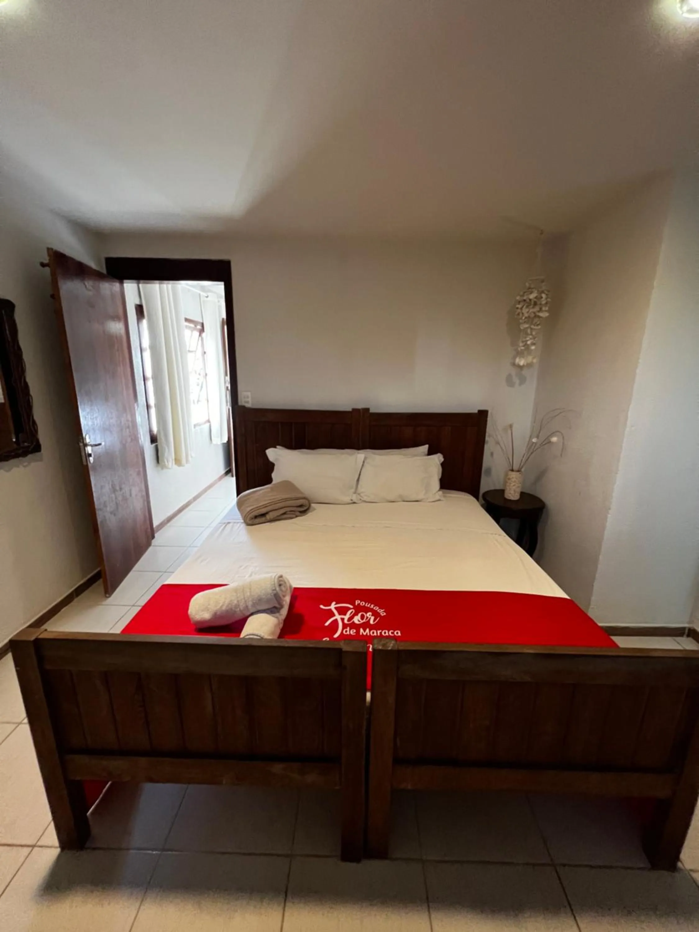 Bed in Pousada Flor de Maraca