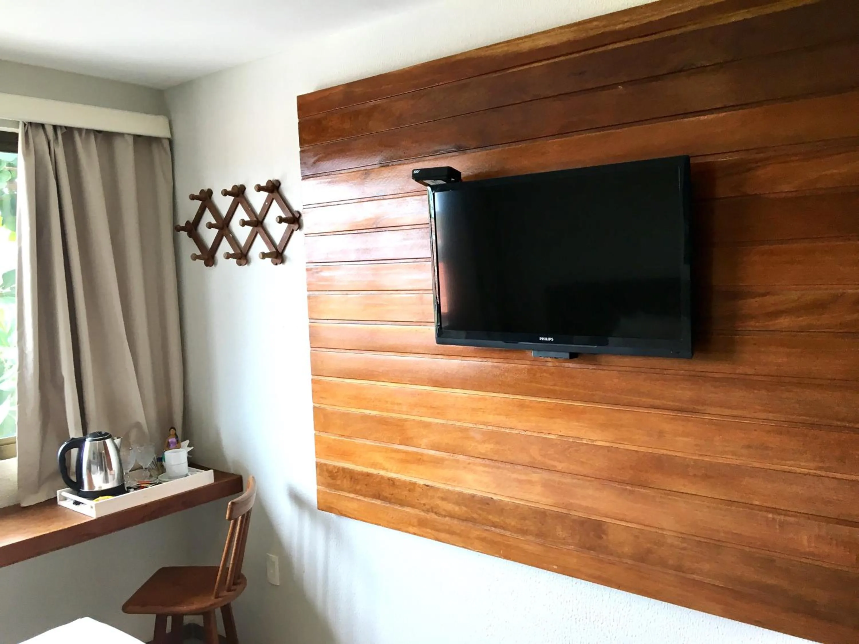 TV and multimedia in Pousada Flor de Maraca