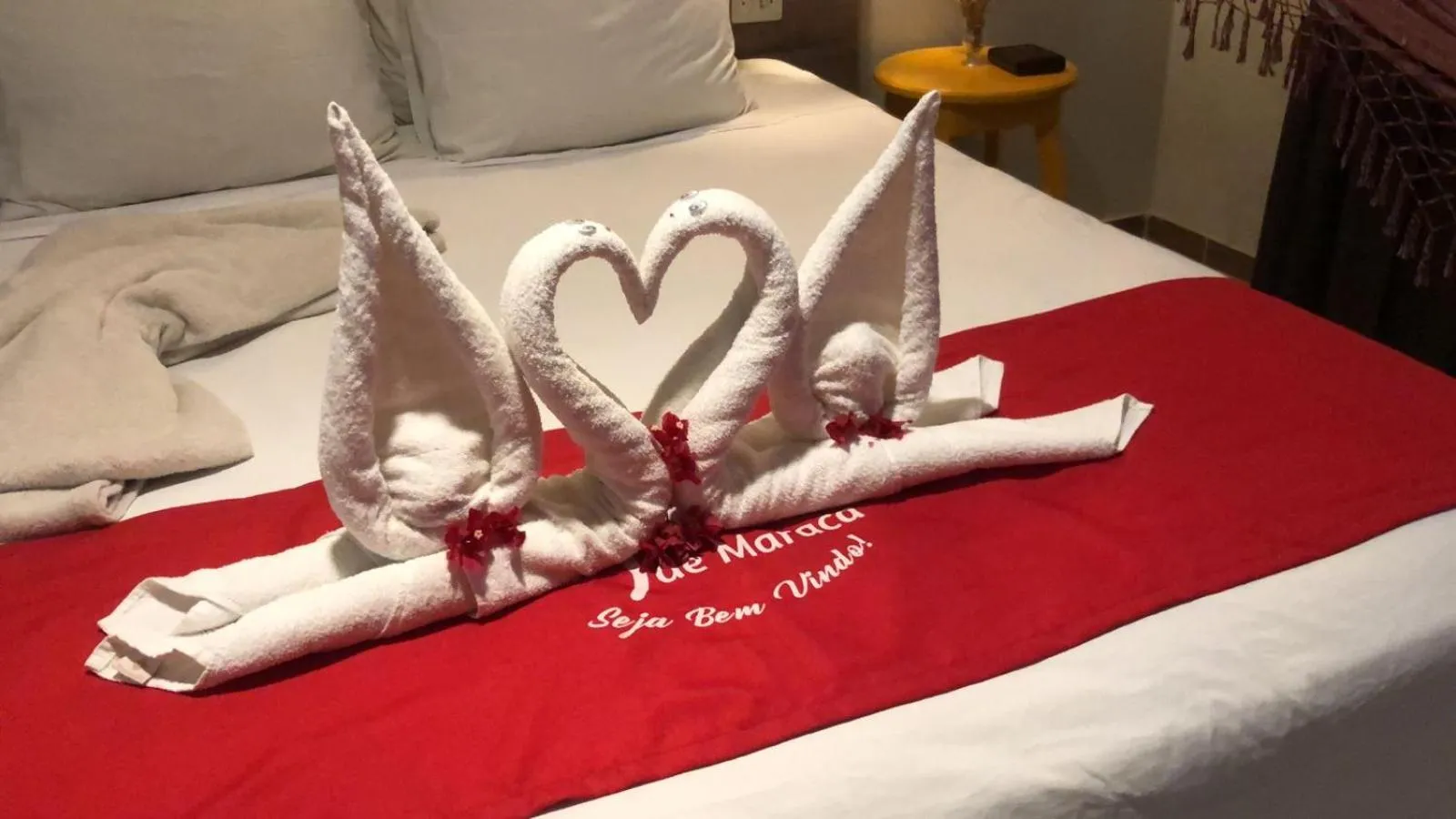 towels, Bed in Pousada Flor de Maraca