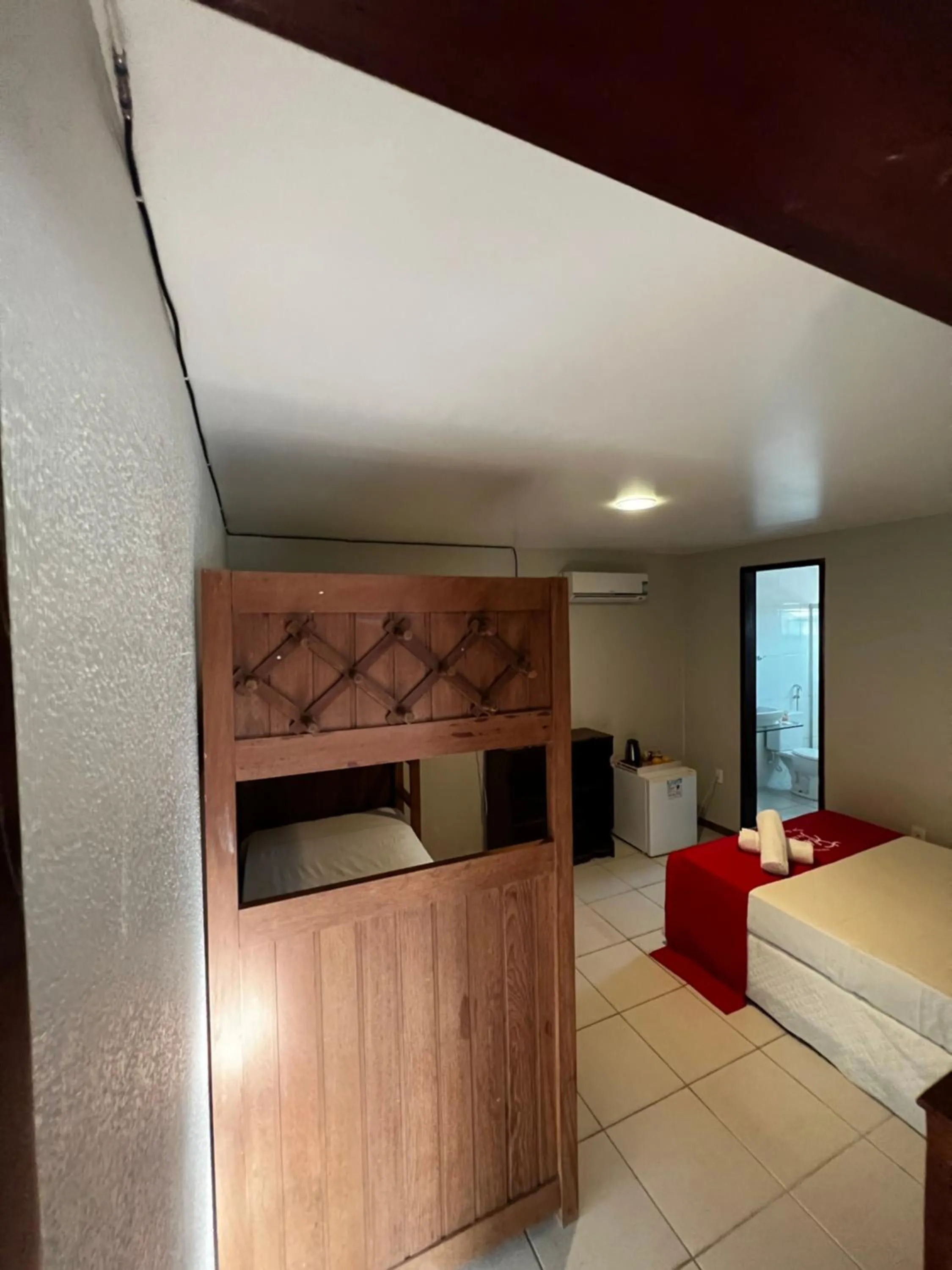 Bed in Pousada Flor de Maraca