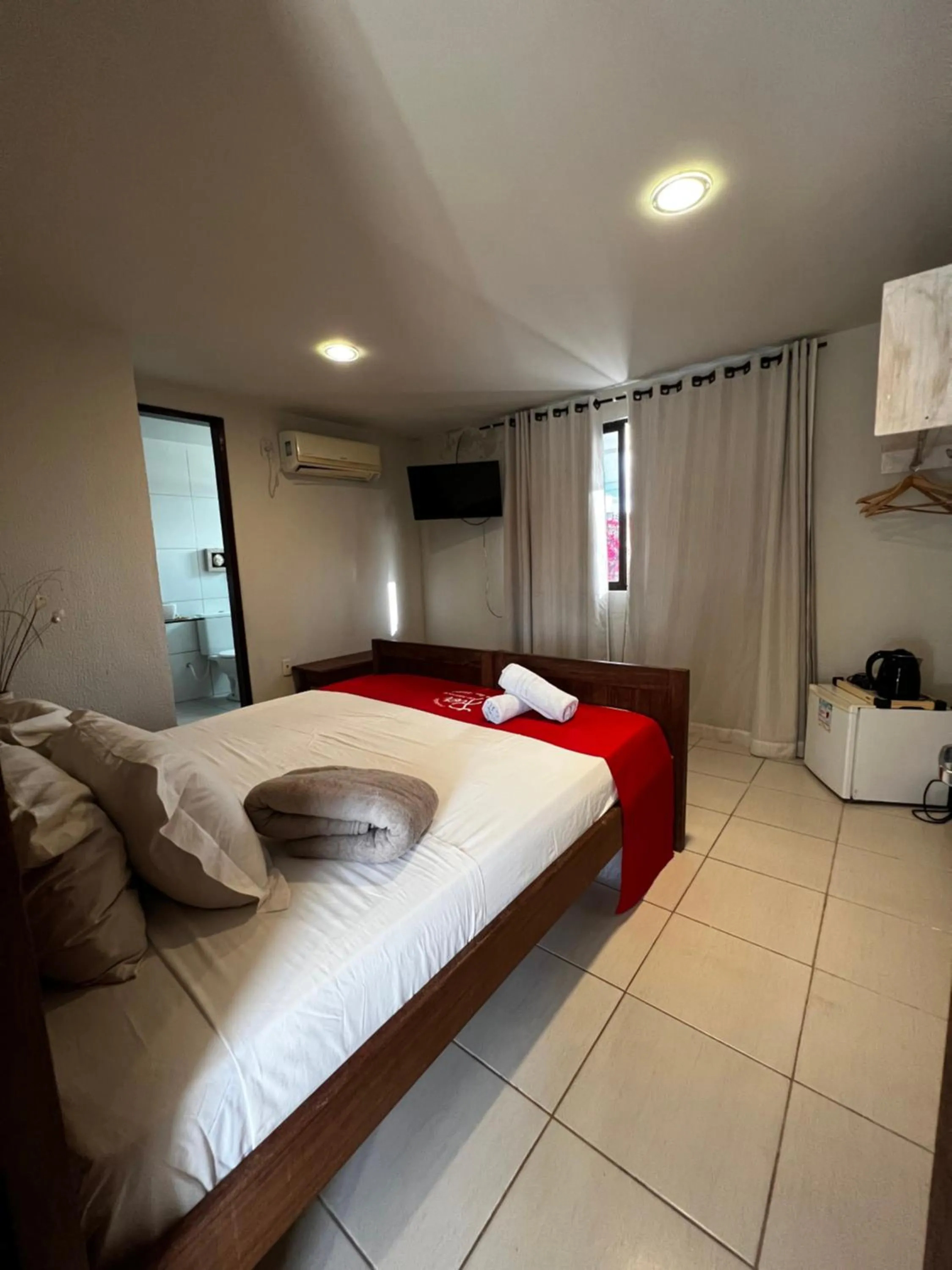 Bed in Pousada Flor de Maraca