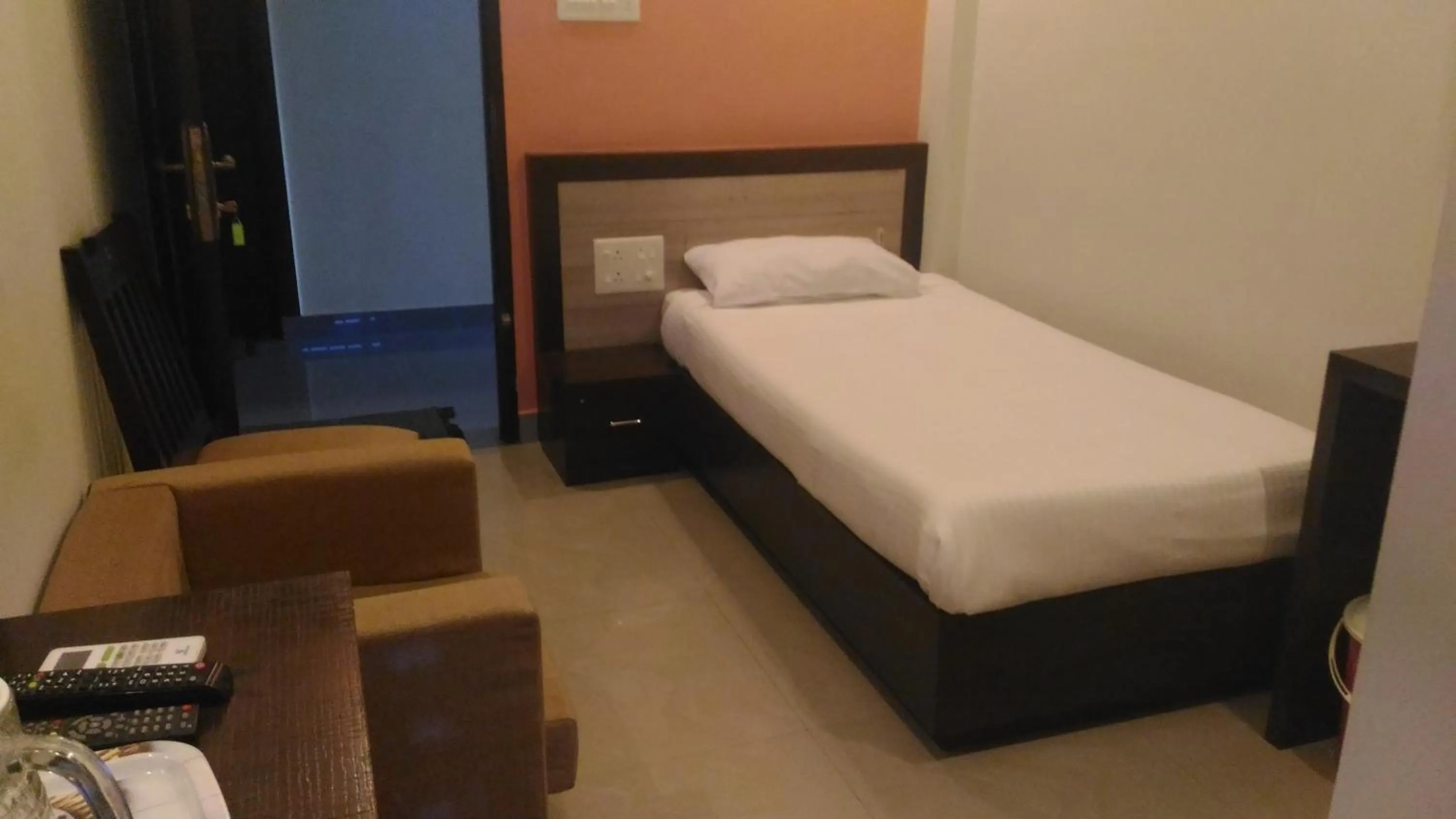 Bed in The Orchid Suites