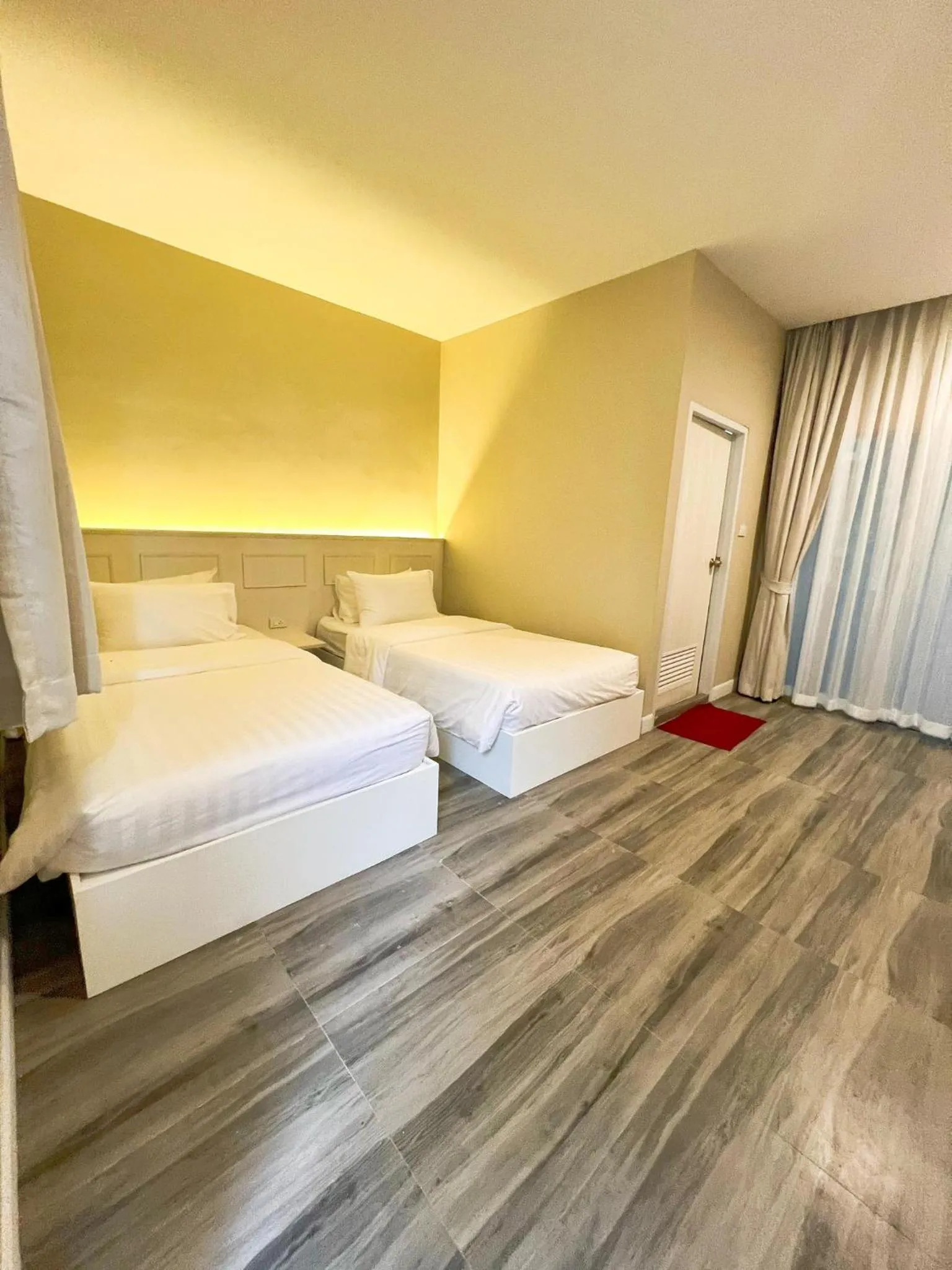 Bed in Srikij GardenHome Resort