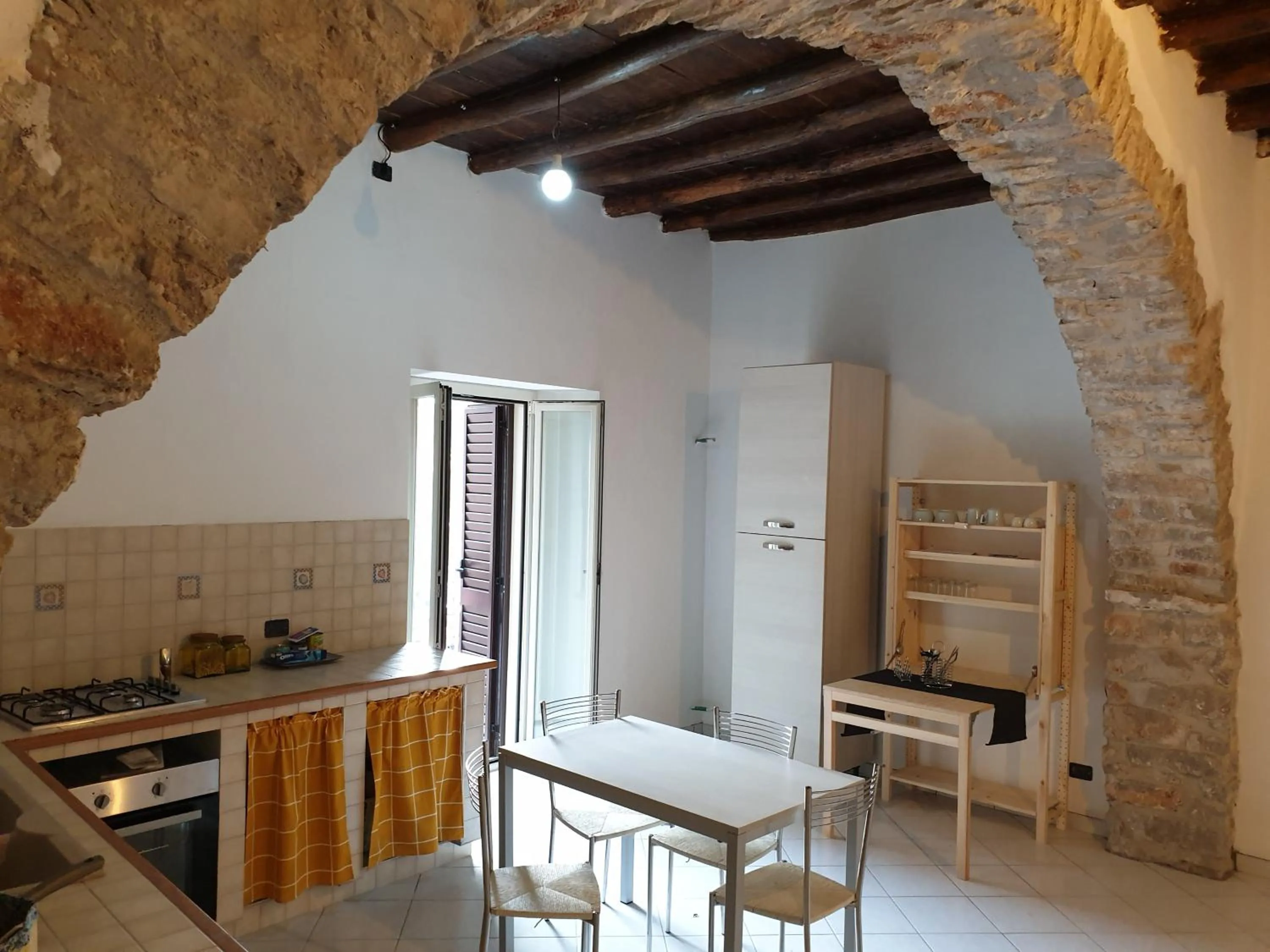 Kitchen or kitchenette in B&B "il Vicoletto"