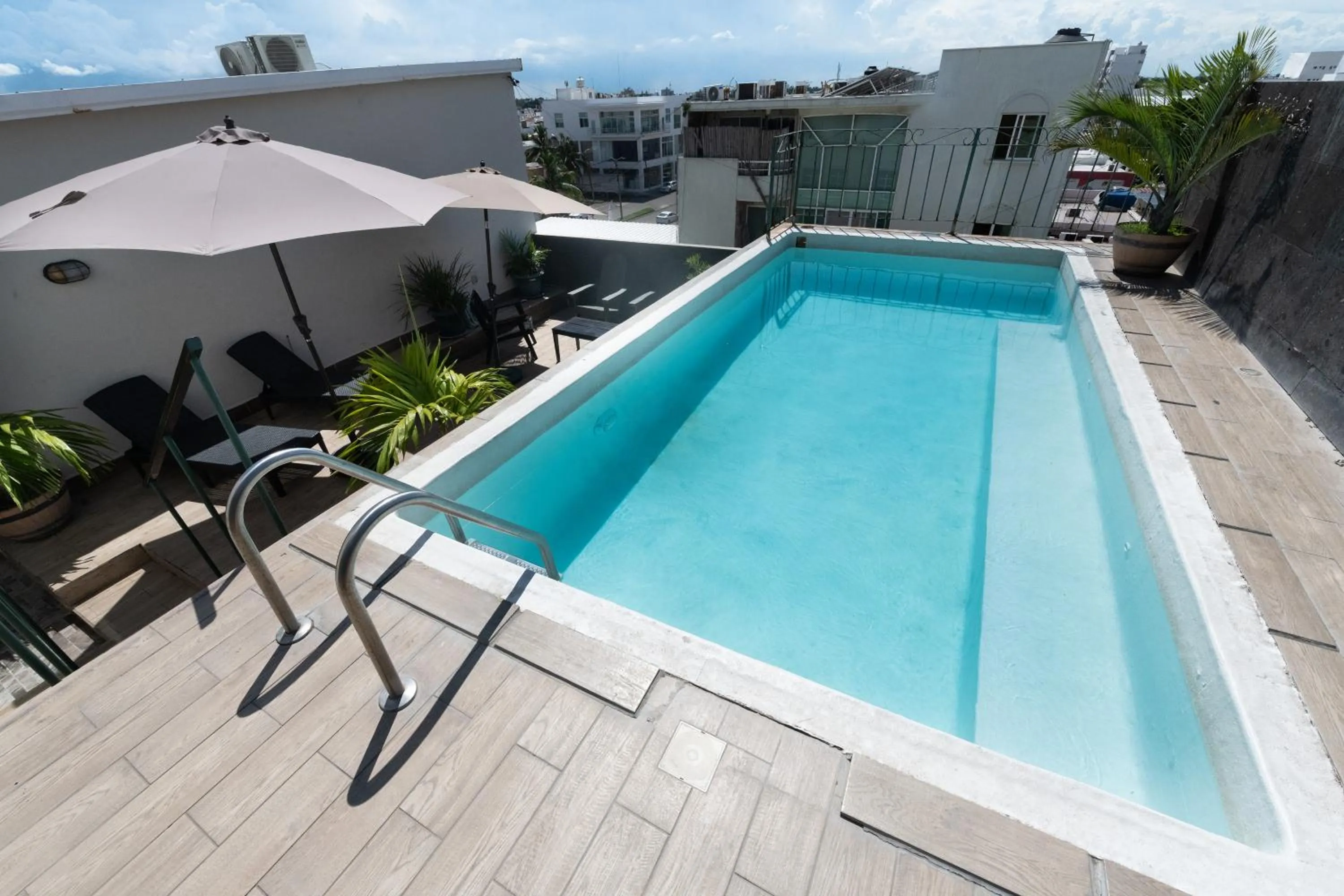 Swimming pool in Boca Inn Hotel & Suites