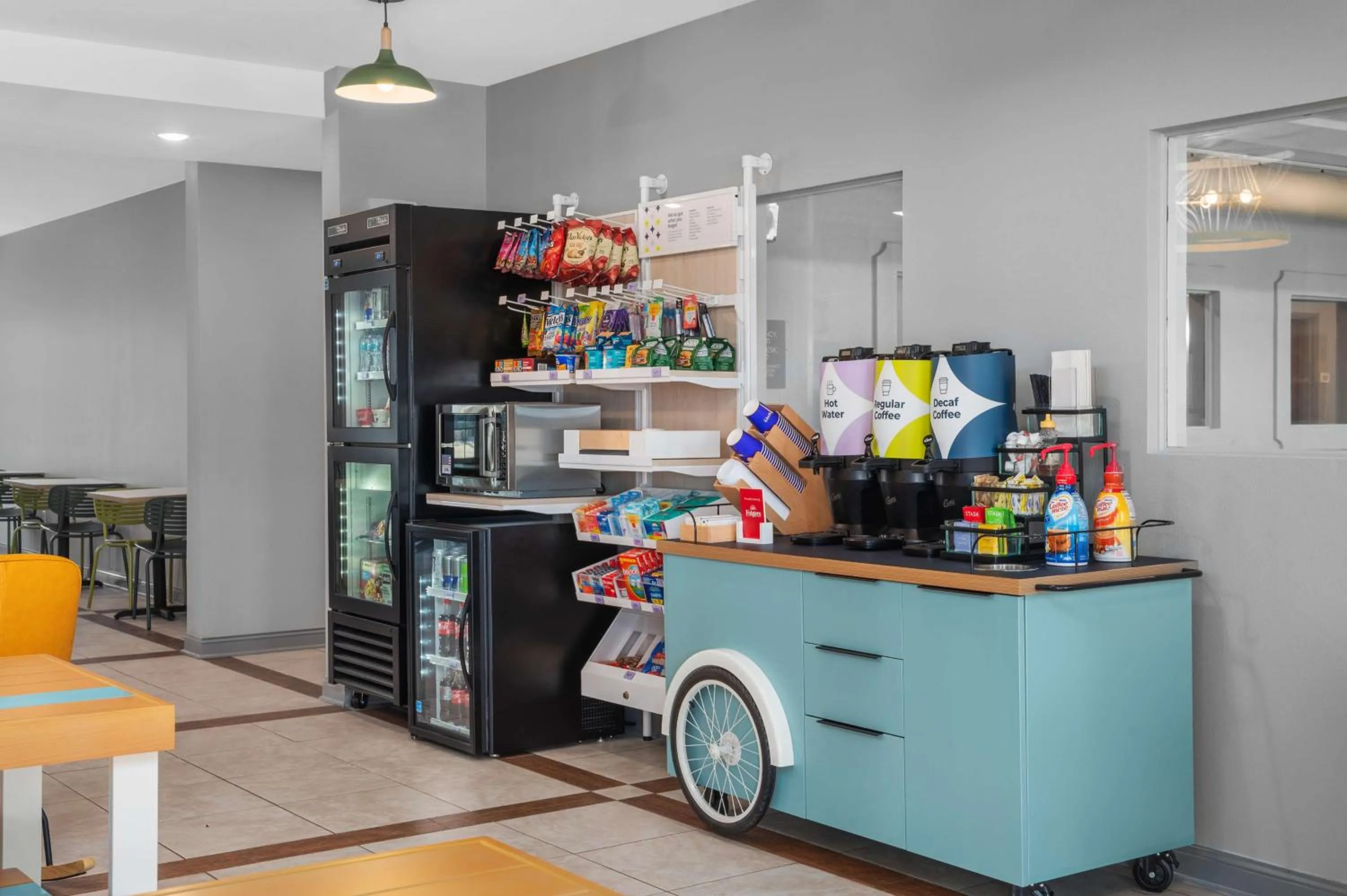 Dining area in Spark by Hilton Minot