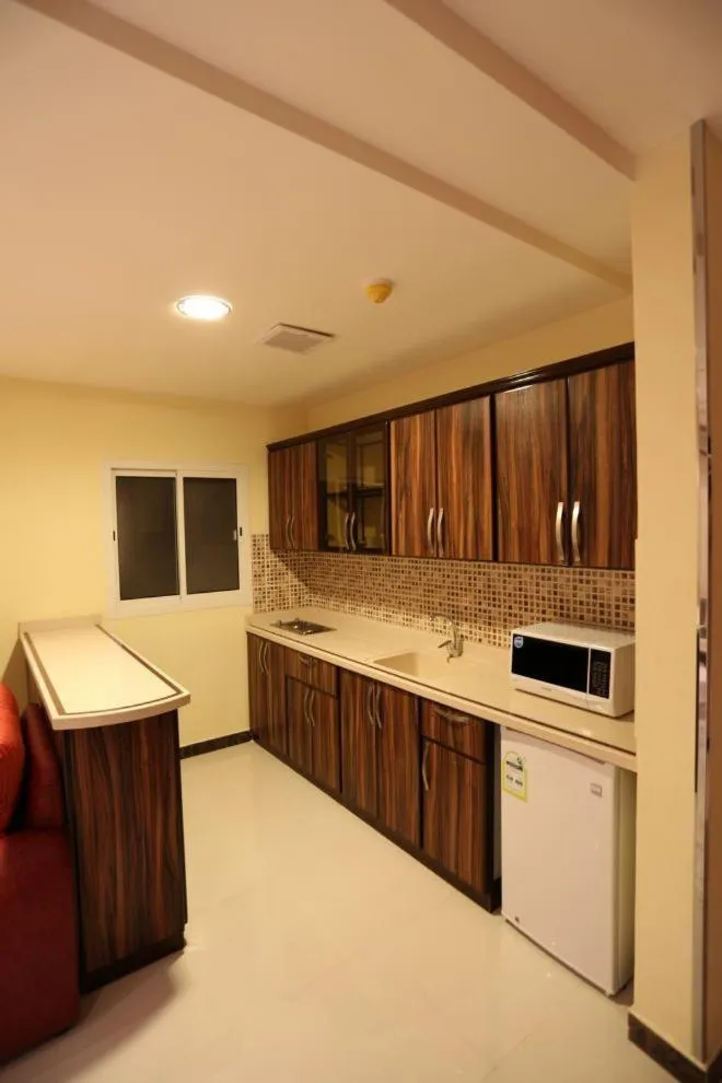 Kitchen or kitchenette in Tulip Rawda Serviced Apartments